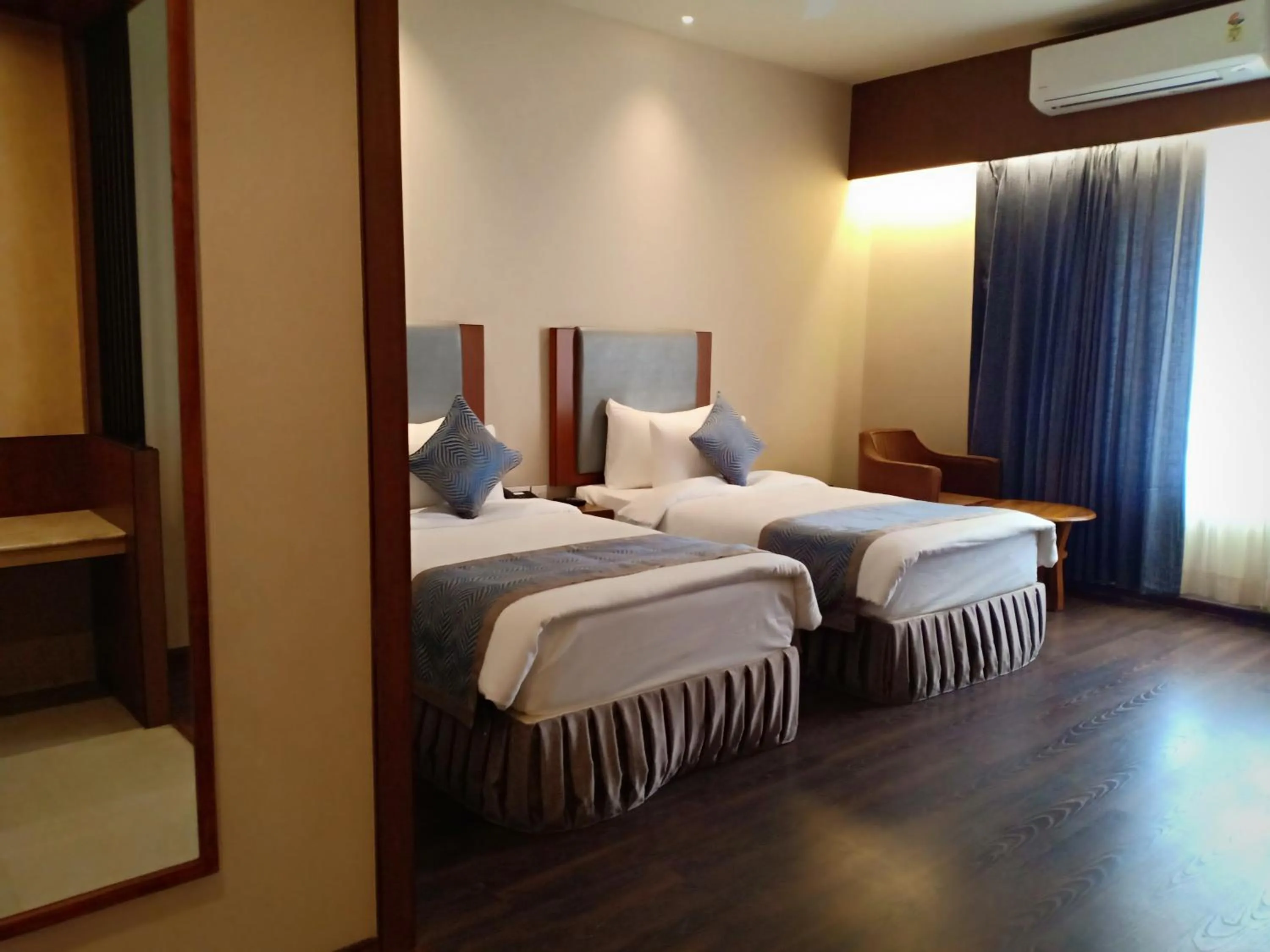 Bed in Pipul Padmaja Premium Hotel