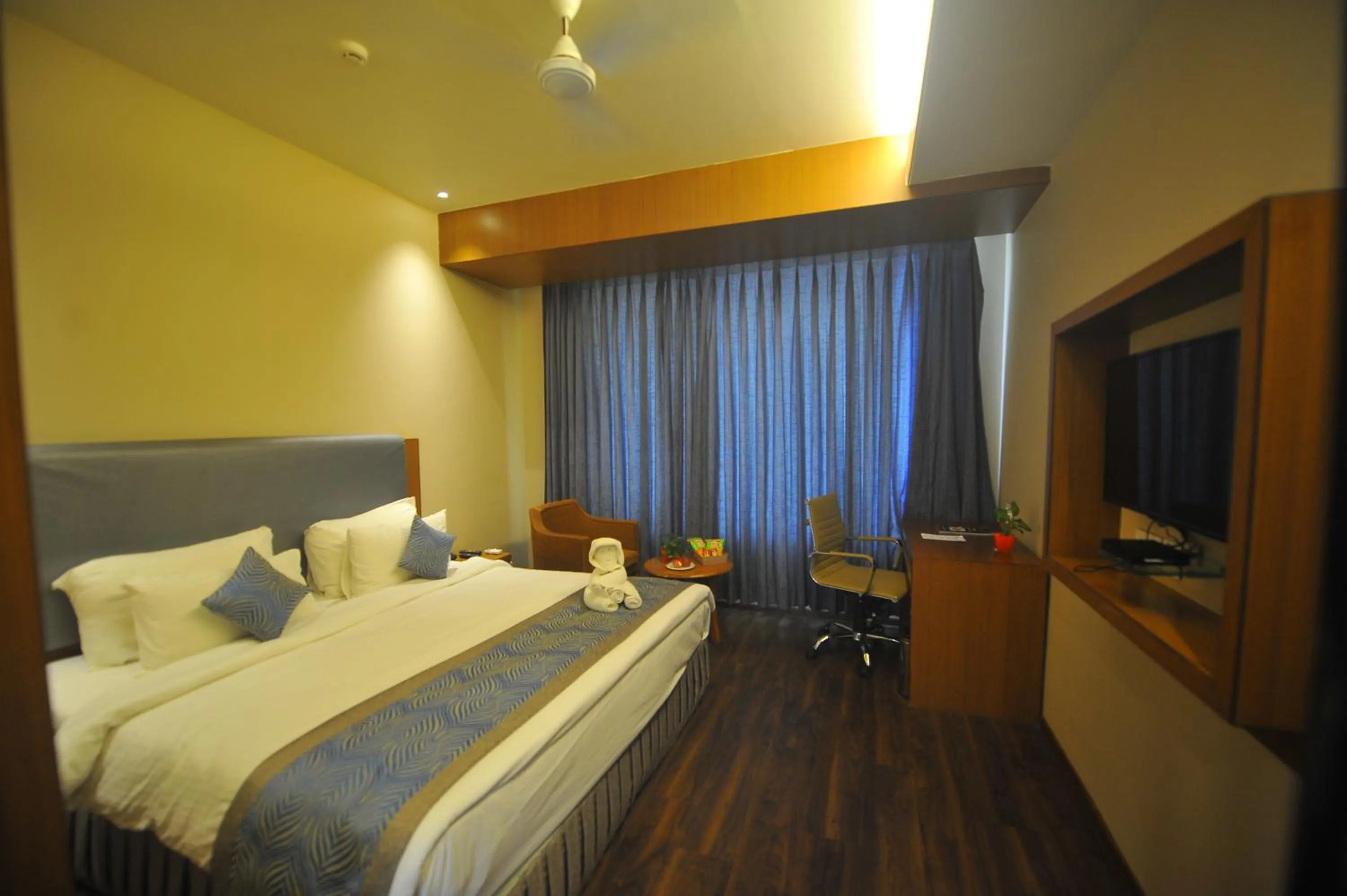 Bed in Pipul Padmaja Premium Hotel