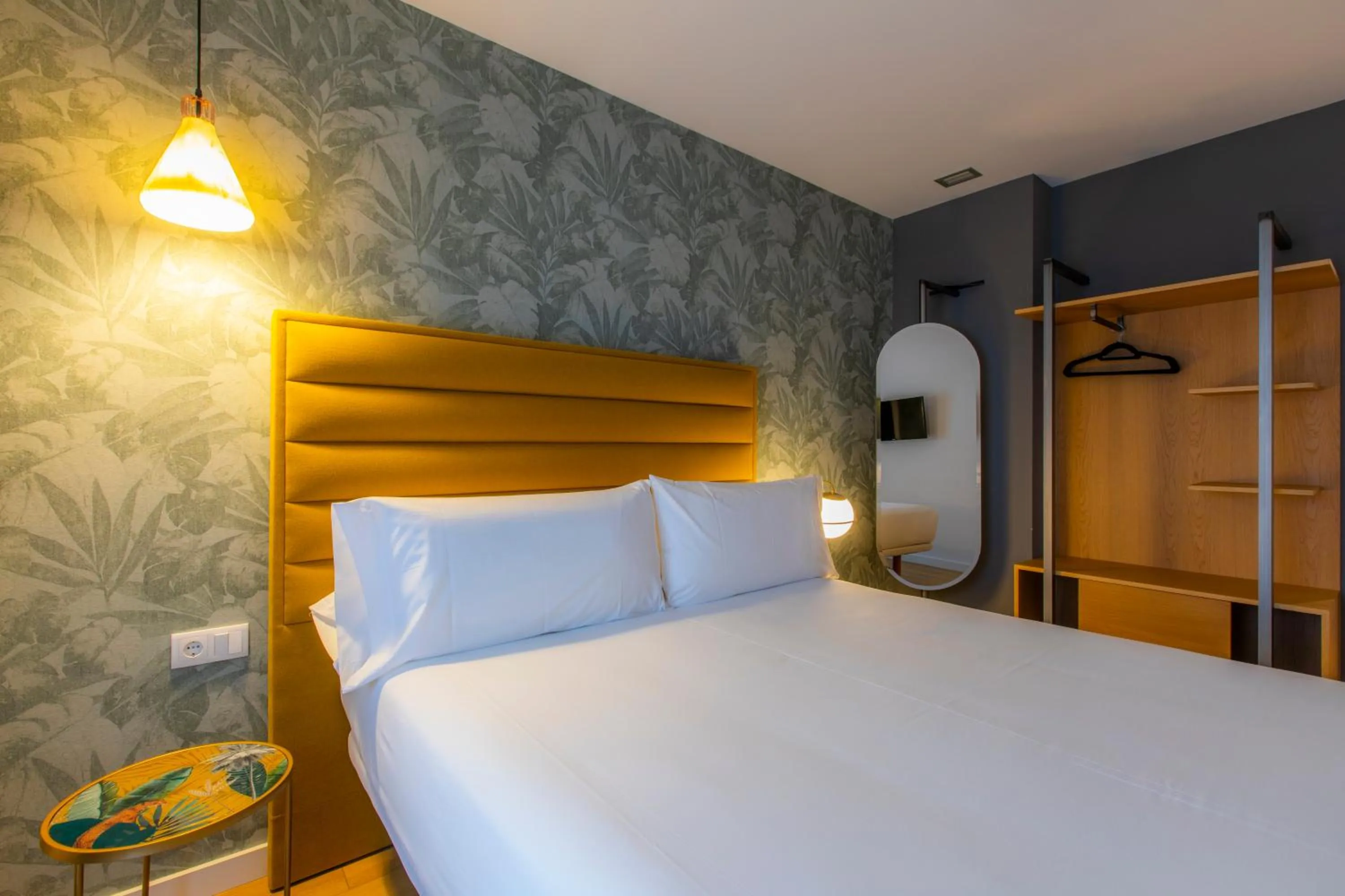 Bed in HOTEL JAVIER MONTERO