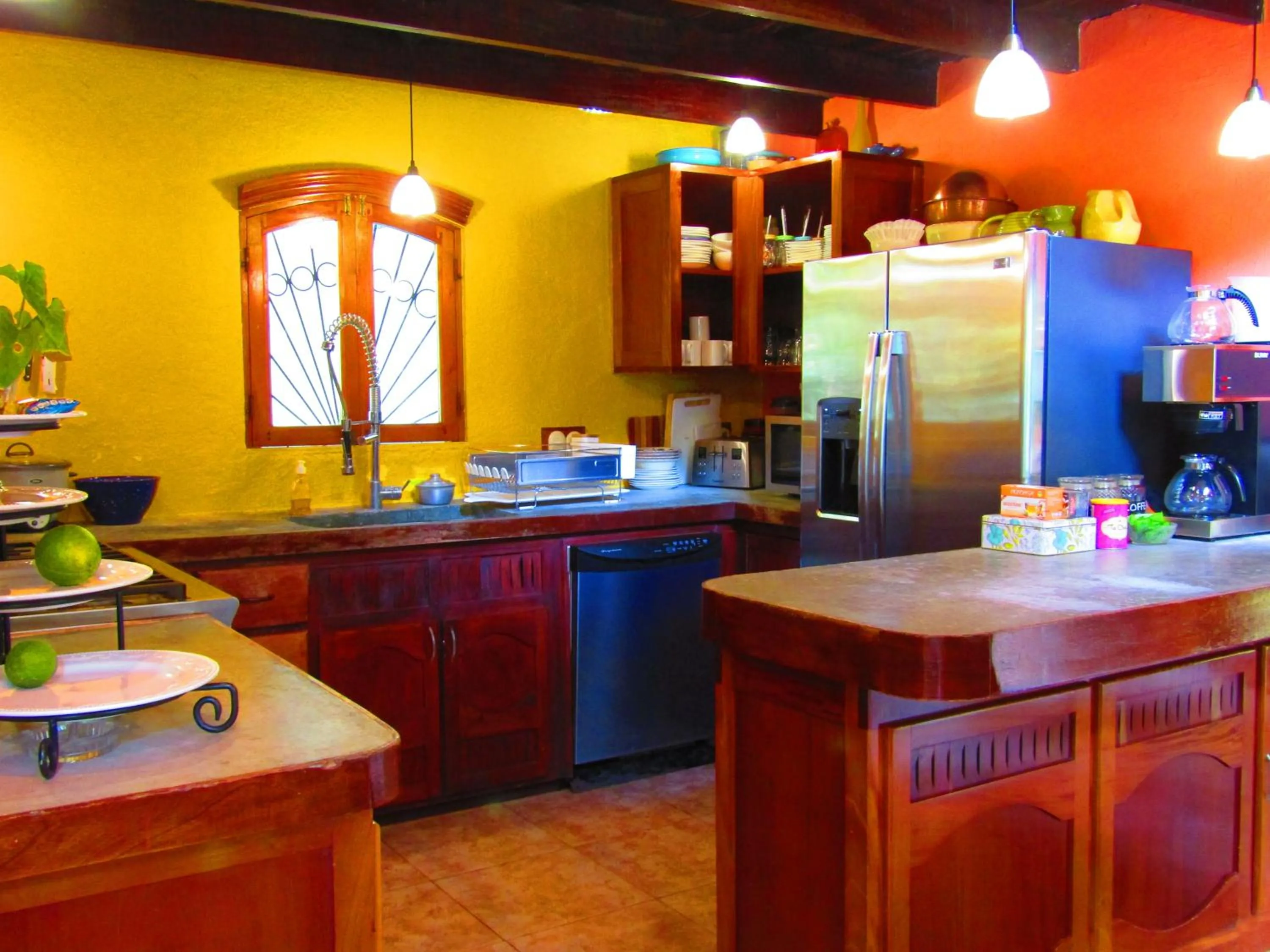 Communal kitchen in Agua Inn