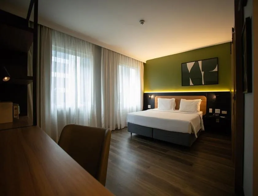 Bed in Park Inn by Radisson Berrini