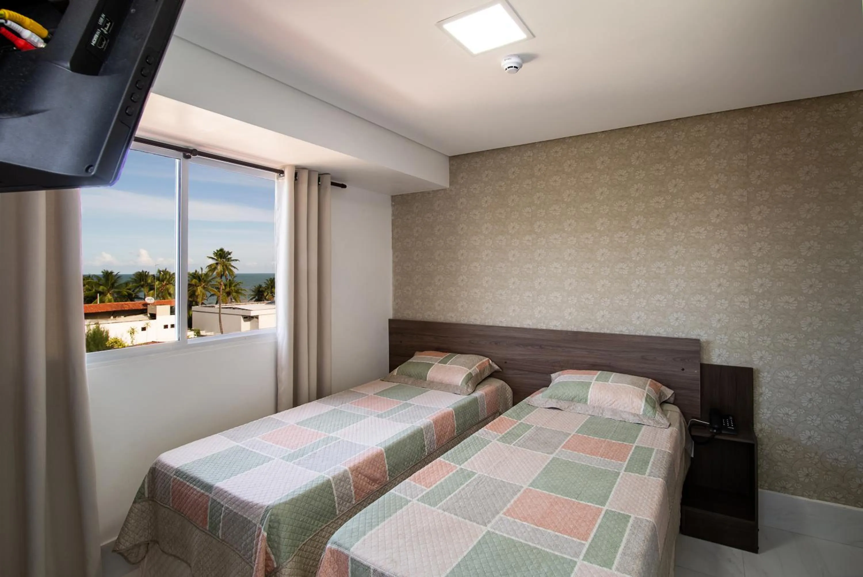 Photo of the whole room, Bed in Tambau Beach Hotel