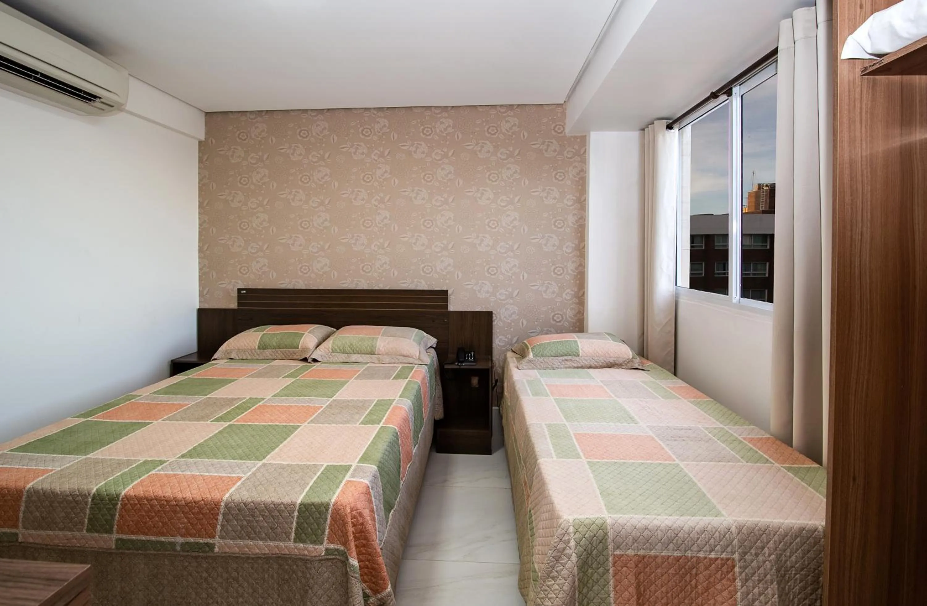 Bed in Tambau Beach Hotel