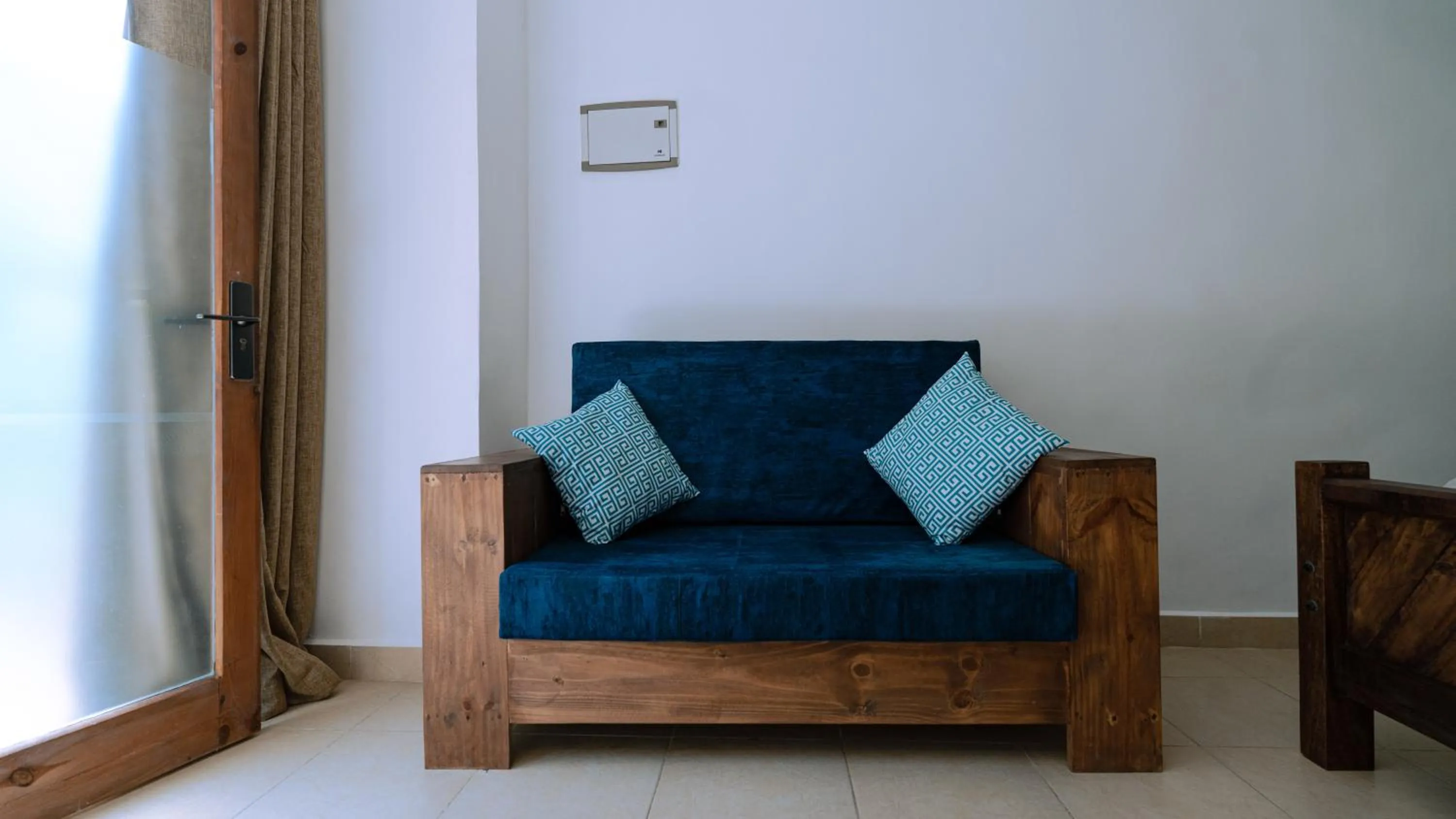 Seating area in Paradise Beach Resort & Spa