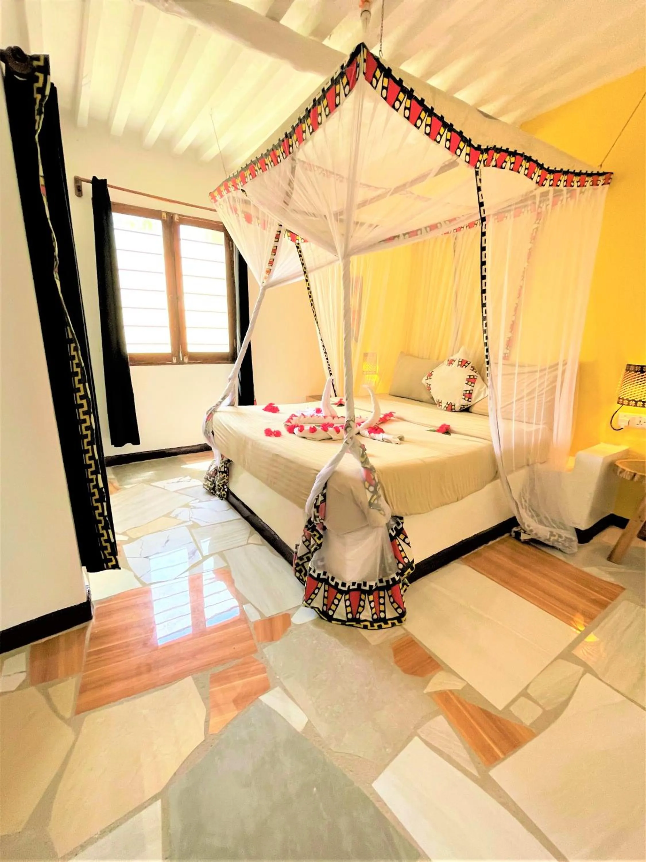 Bed in Paradise Beach Resort & Spa