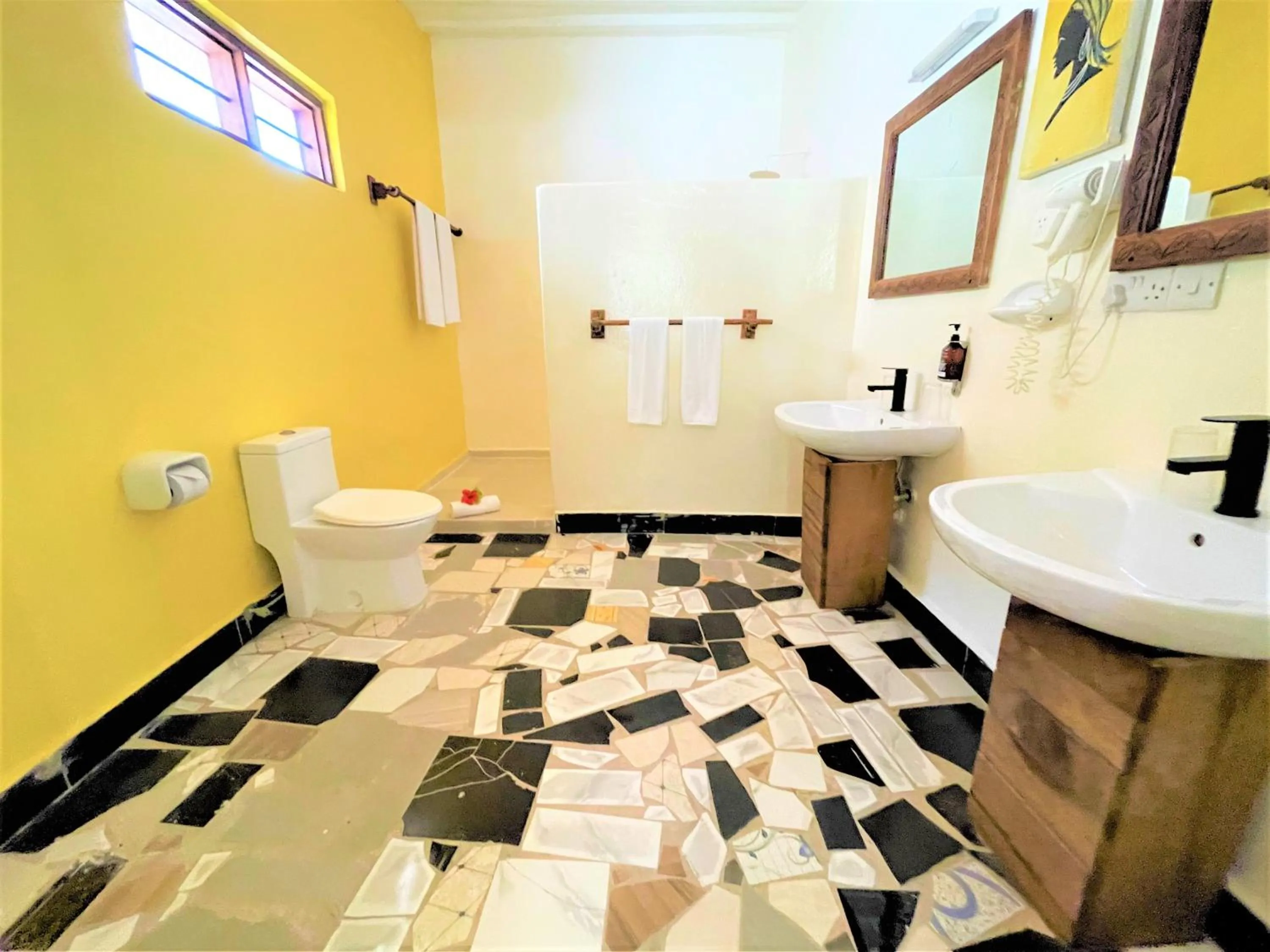 Toilet in Paradise Beach Resort & Spa