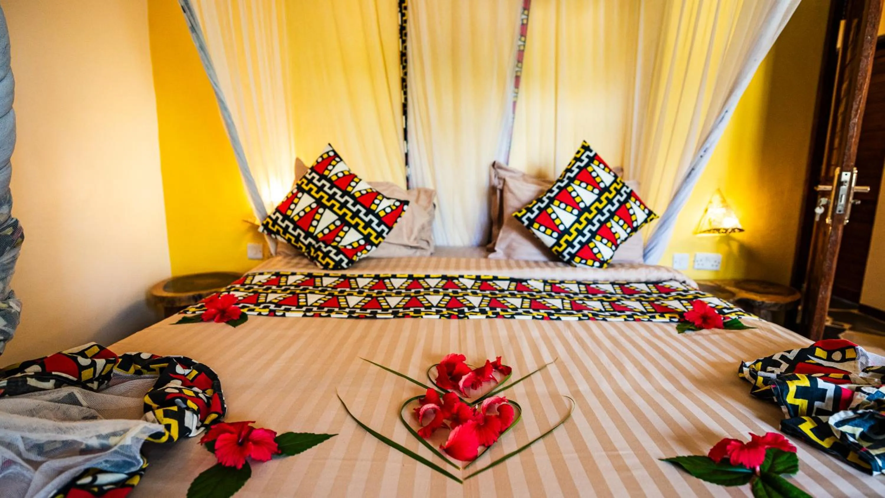 Bed in Paradise Beach Resort & Spa