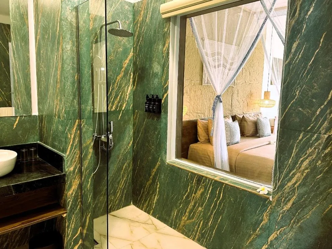 Shower in Paradise Beach Resort & Spa