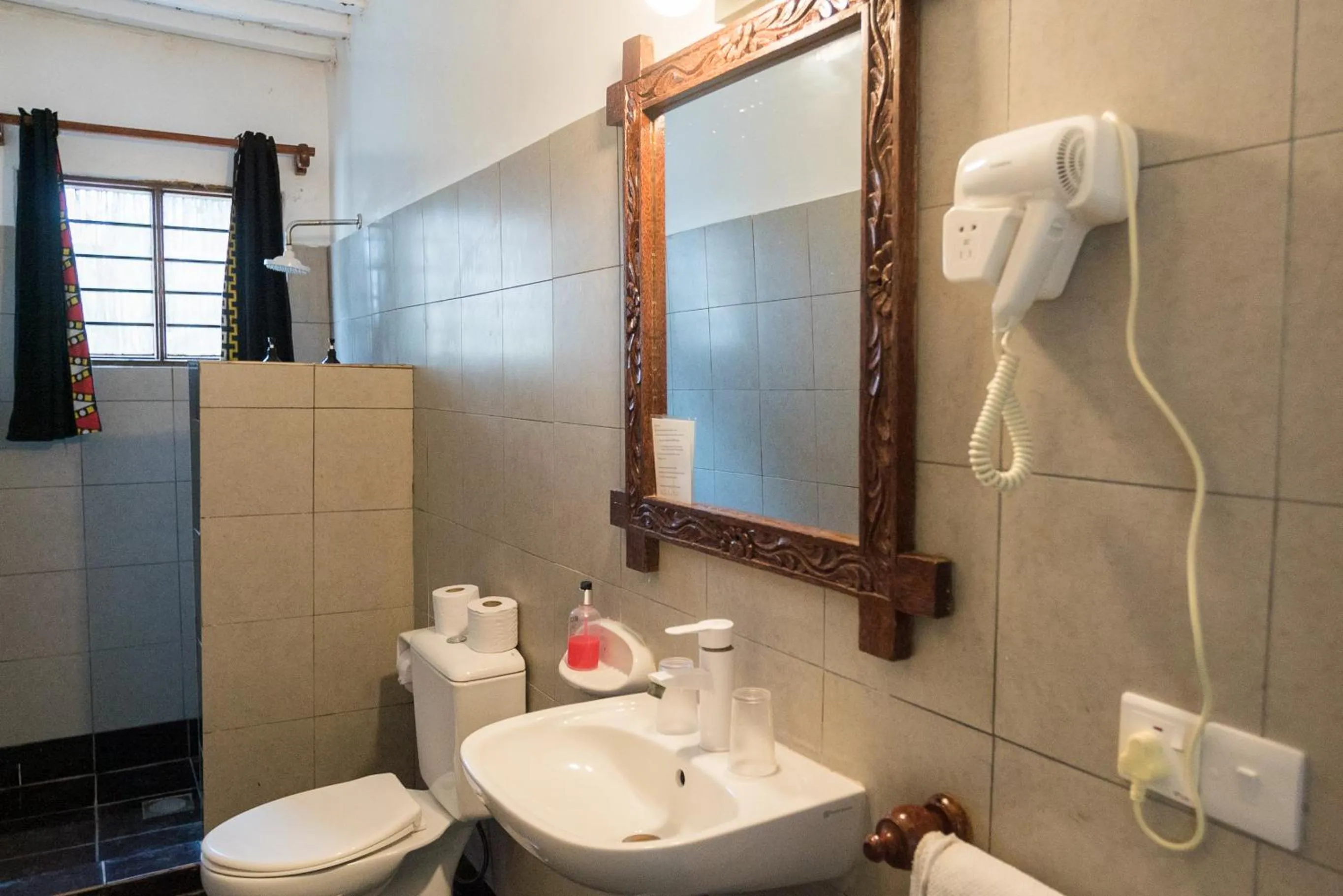 Toilet in Paradise Beach Resort & Spa