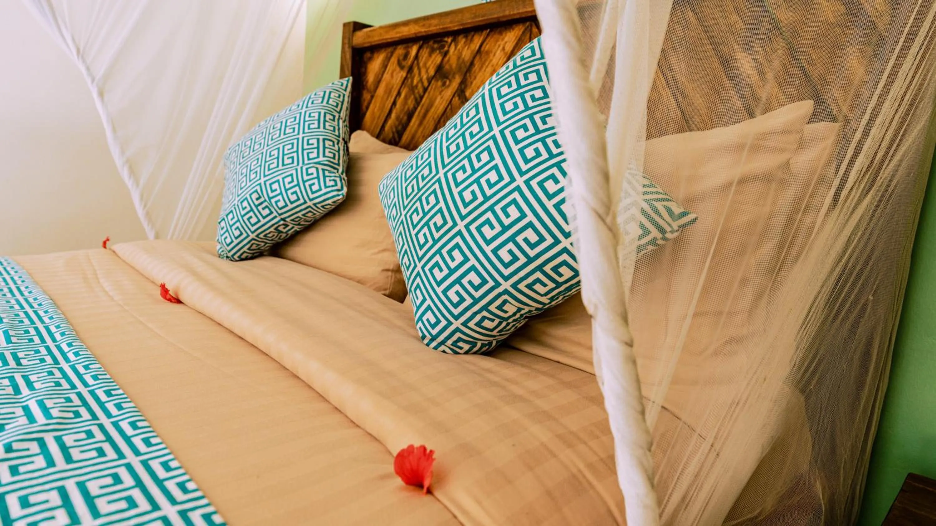 Bed in Paradise Beach Resort & Spa