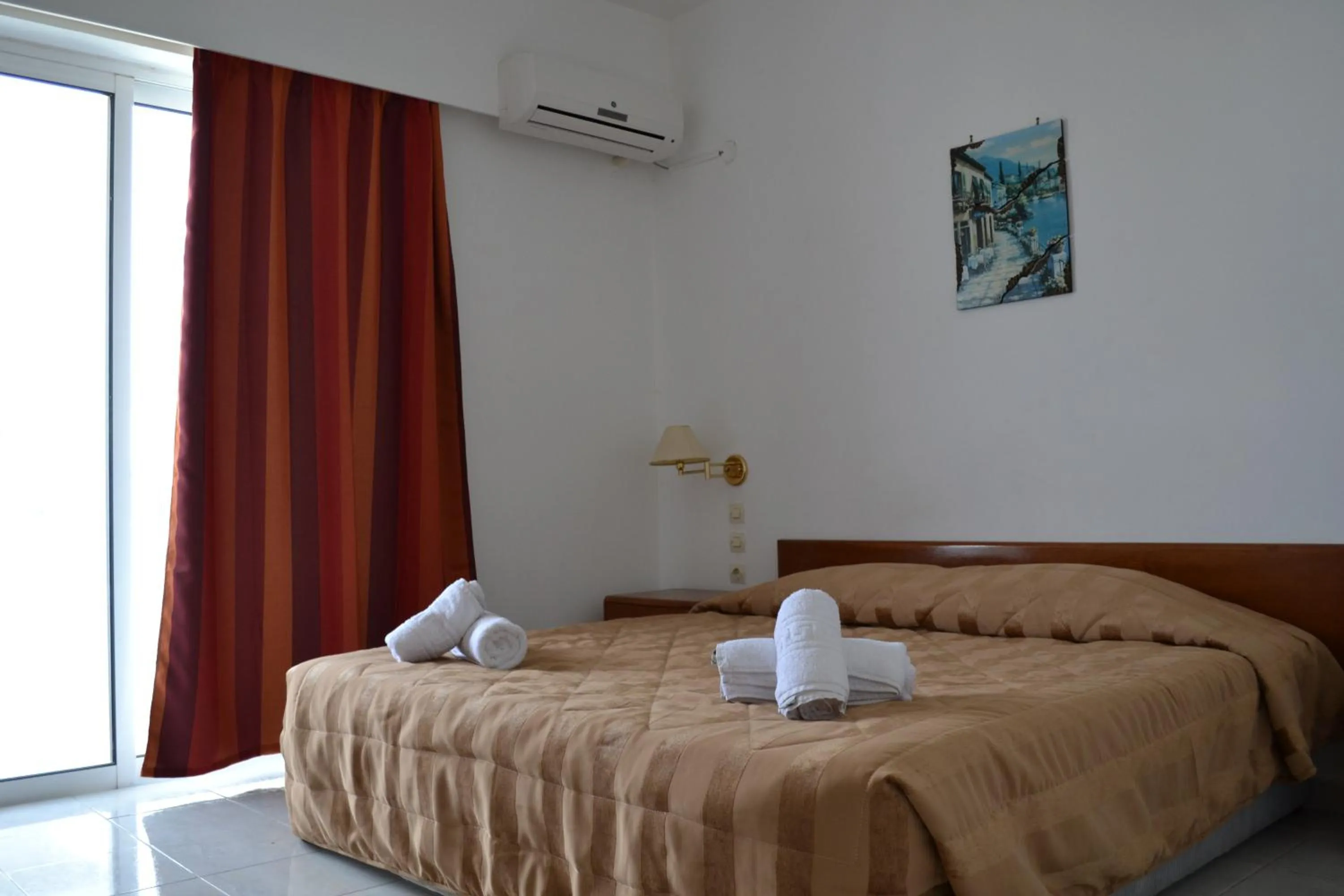 Bed in Panorama Hotel Apartments