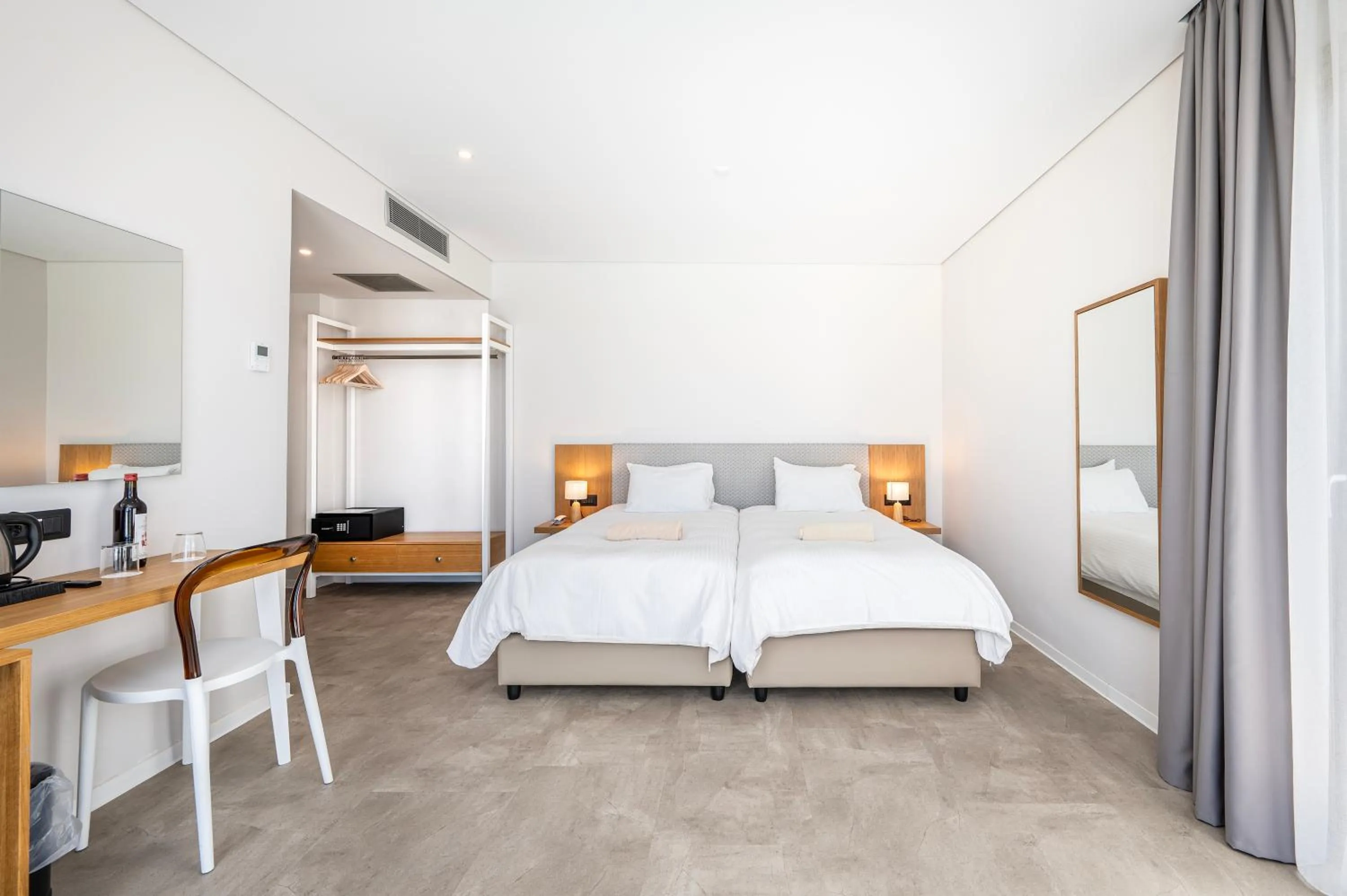 Bed in Athina Palace Resort & Spa