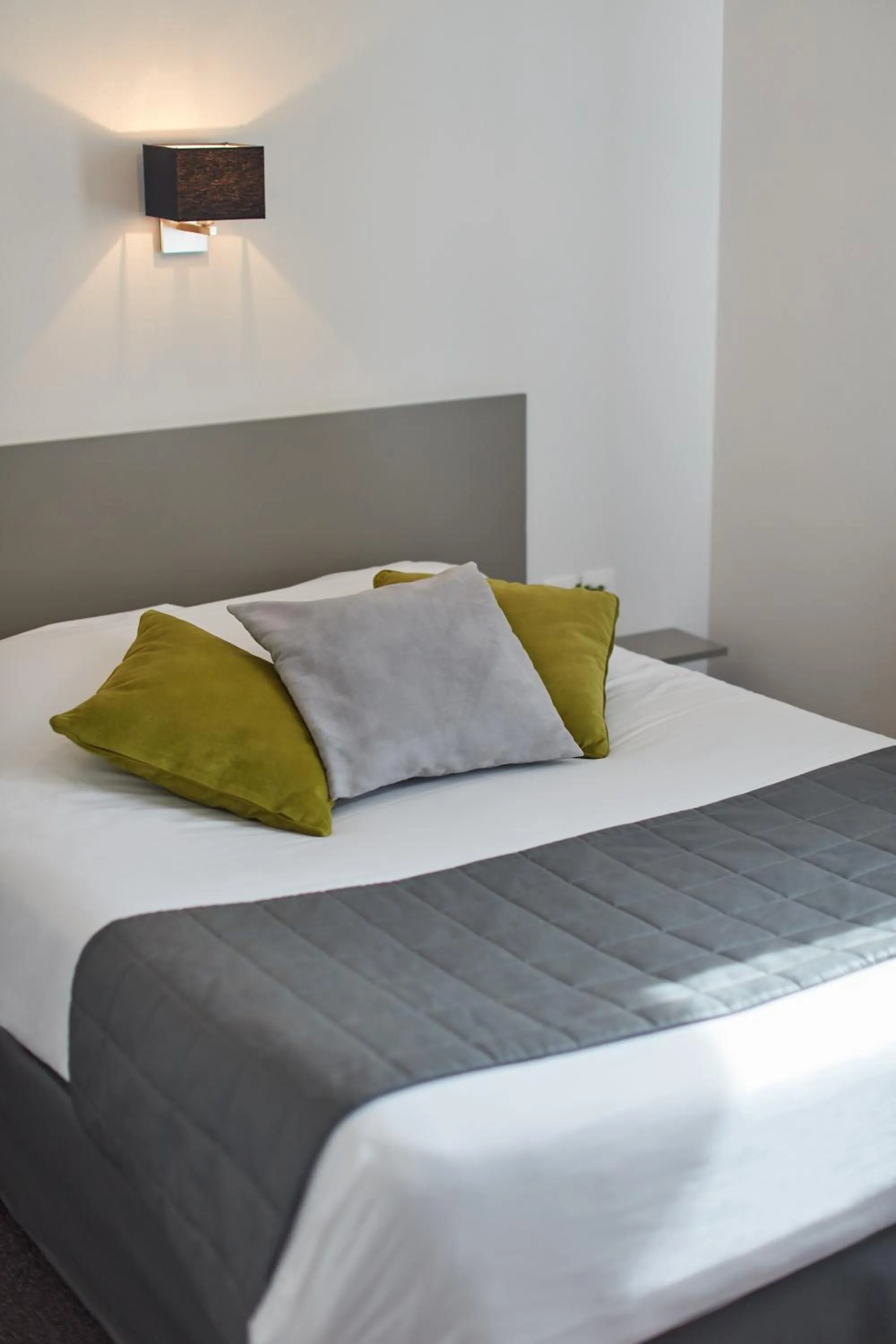 Bed in Hotel De La Pommeraie