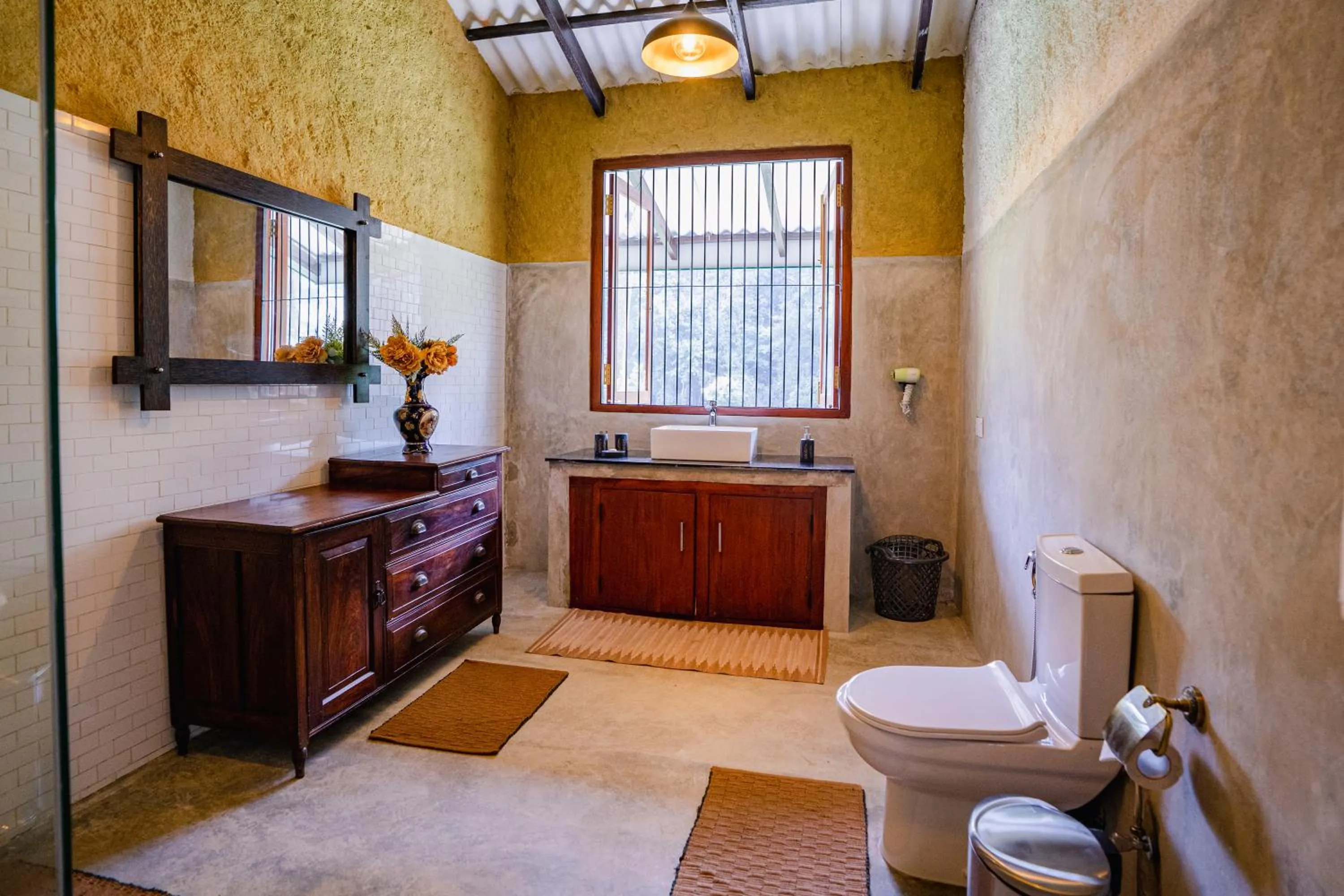 Toilet in Arsulana Eco Lodge & Spa