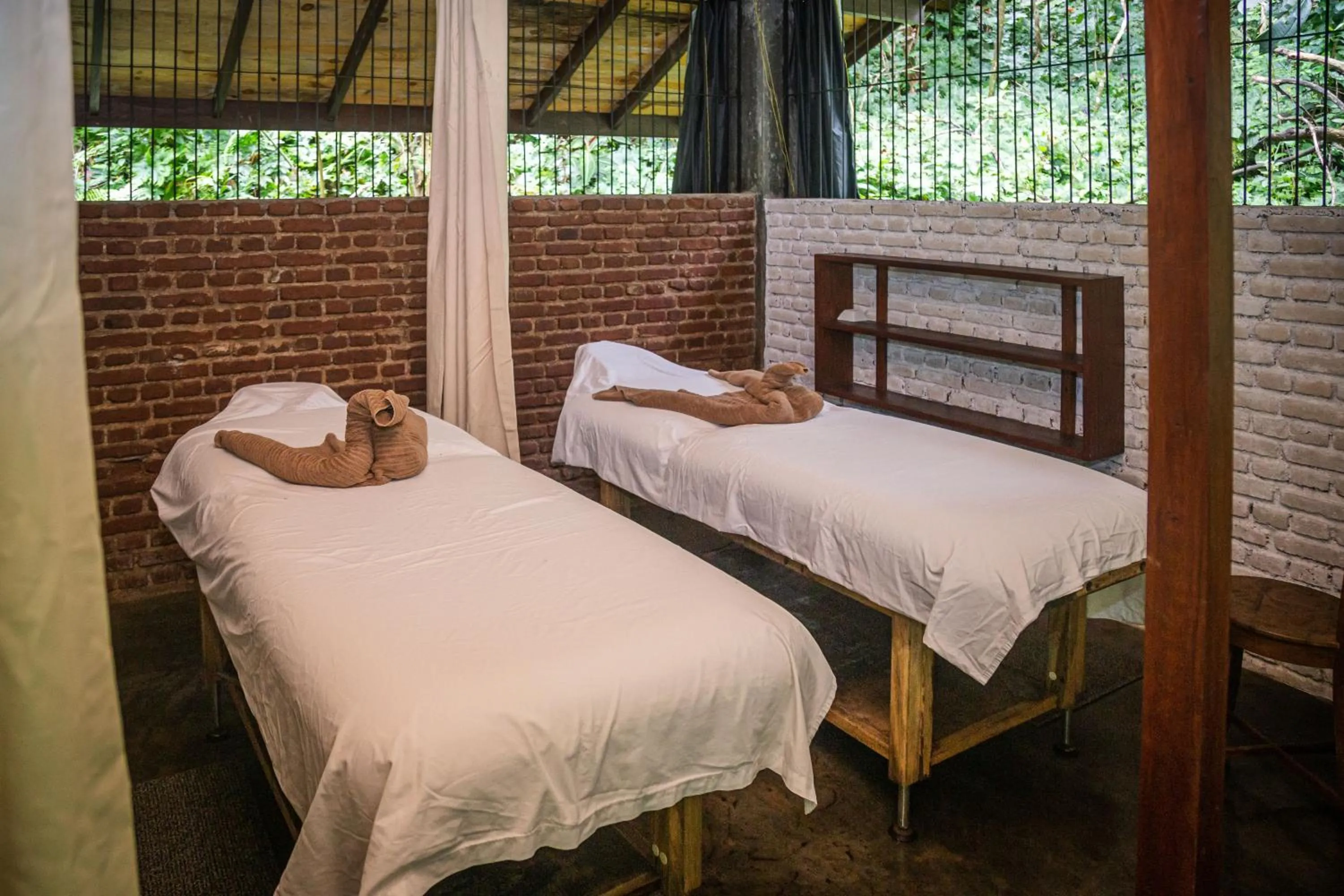 Bed in Arsulana Eco Lodge & Spa