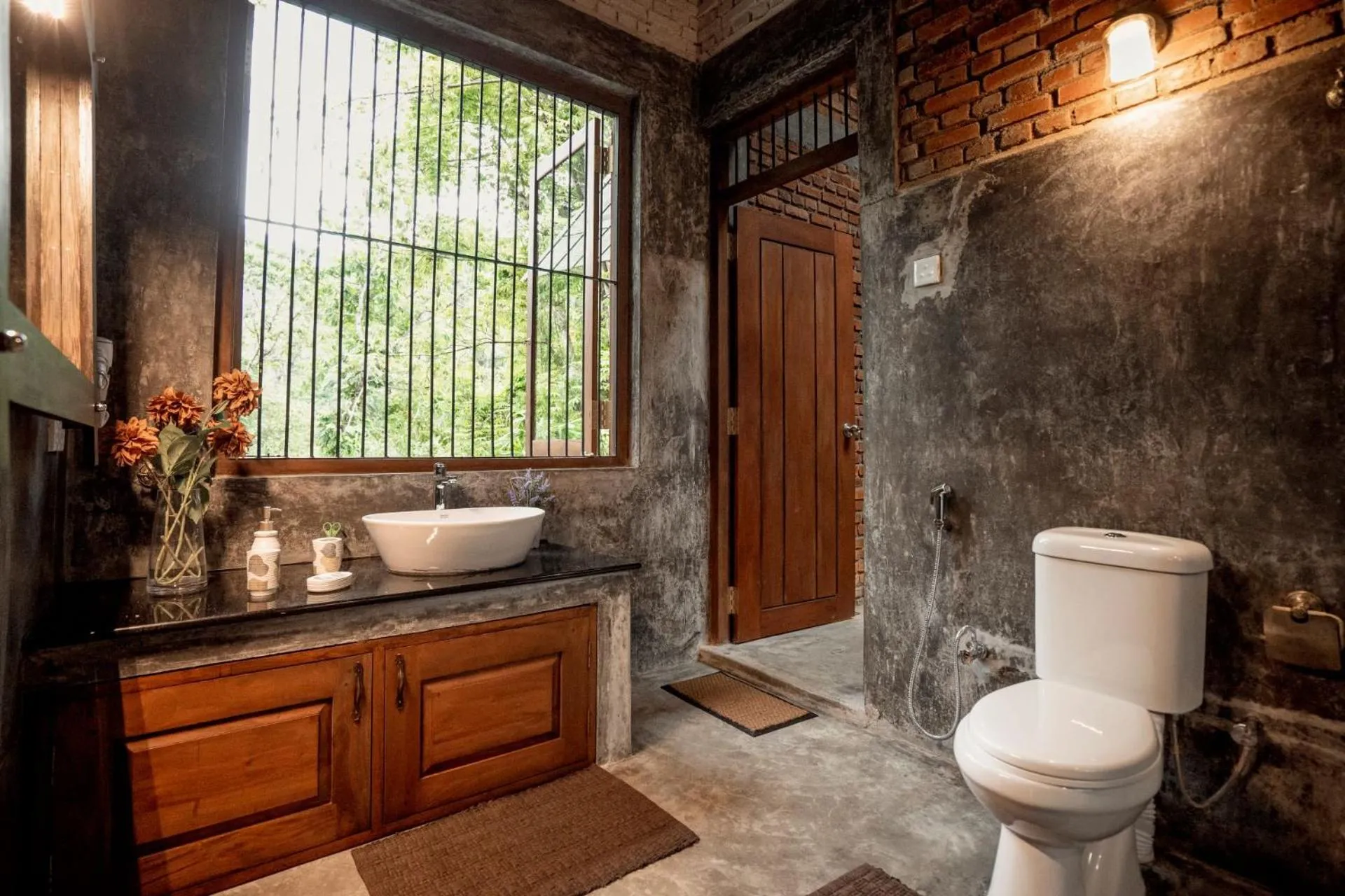 Toilet in Arsulana Eco Lodge & Spa
