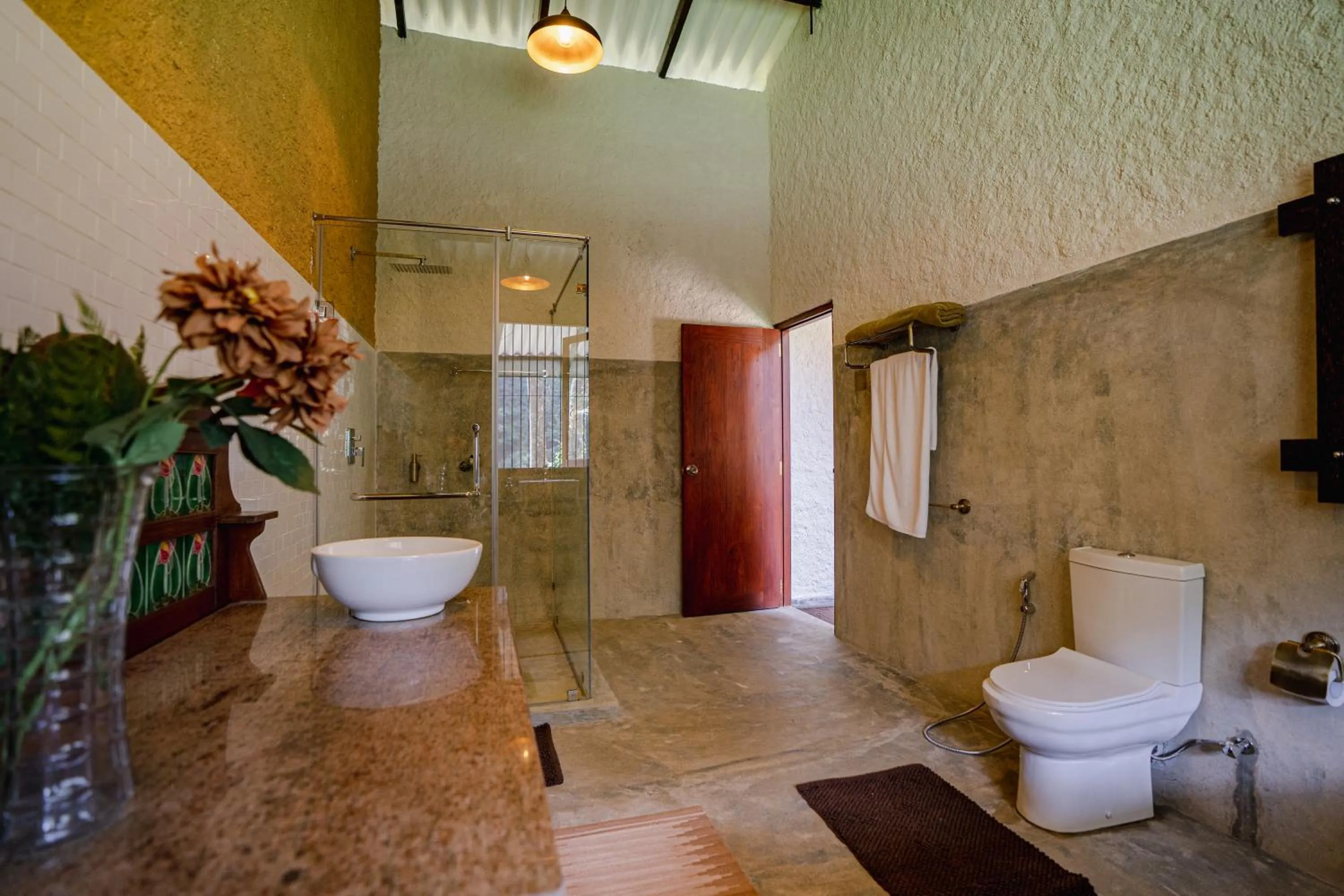 Toilet in Arsulana Eco Lodge & Spa