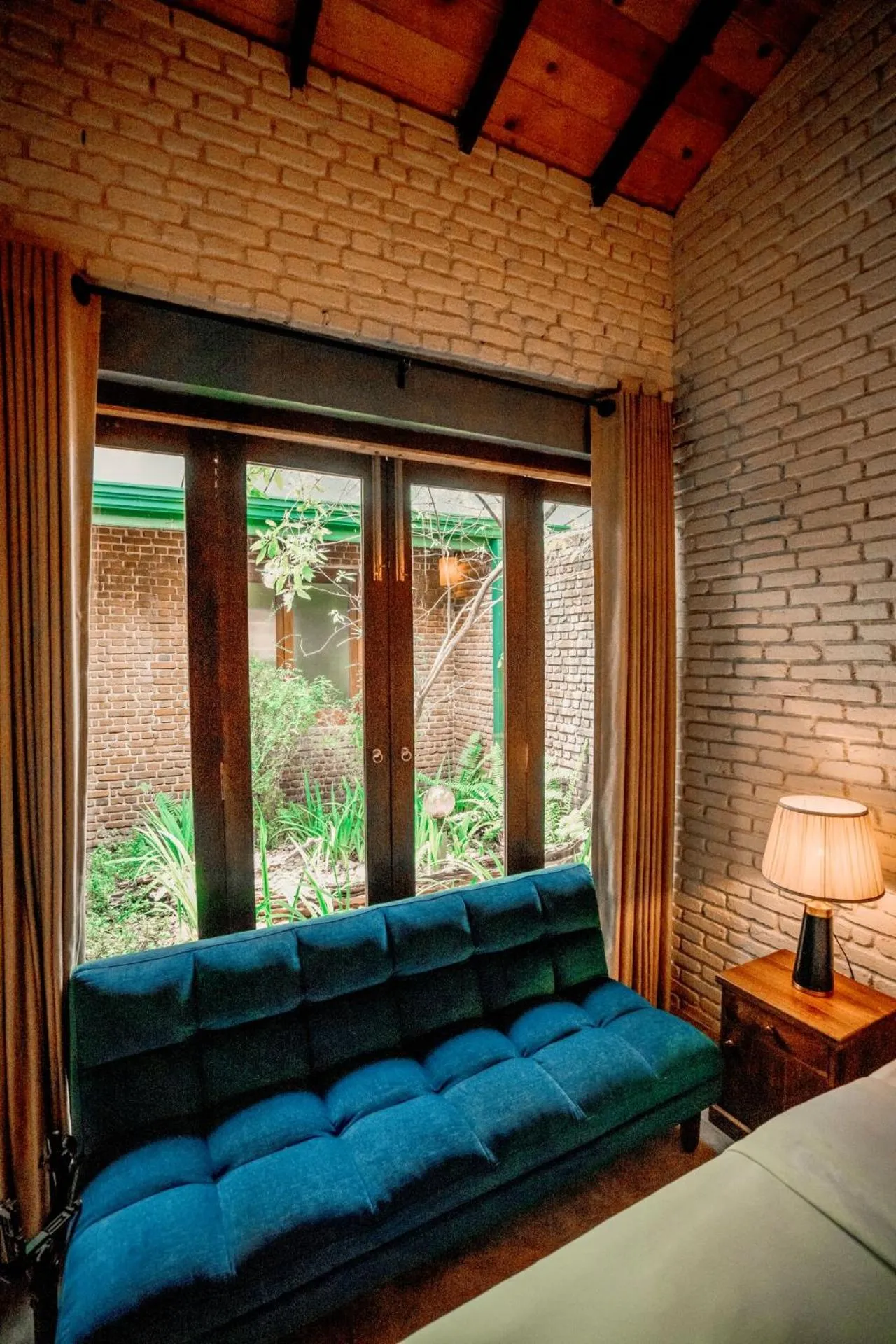 Seating area, Bed in Arsulana Eco Lodge & Spa