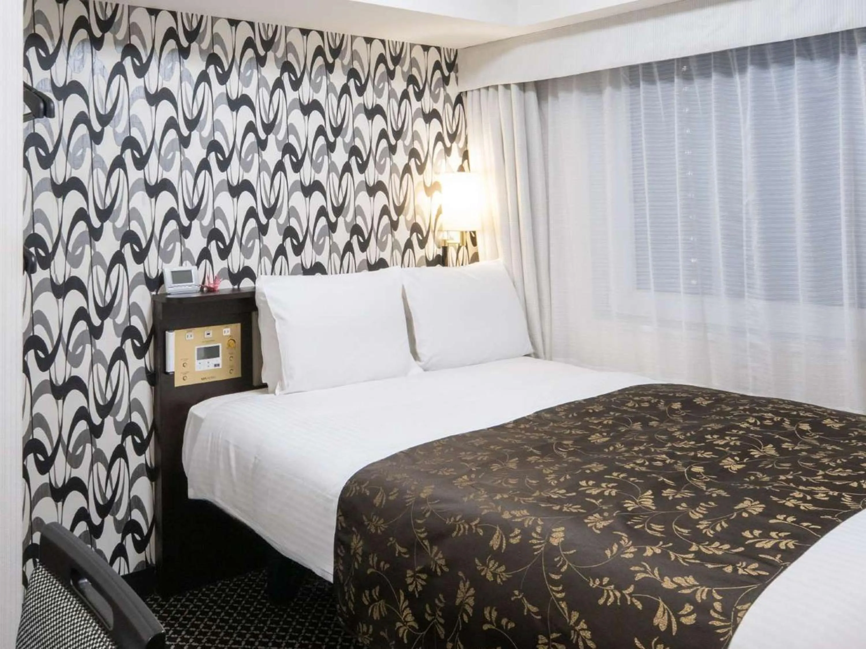 Photo of the whole room, Bed in APA Hotel Ueno Inaricho Ekikita