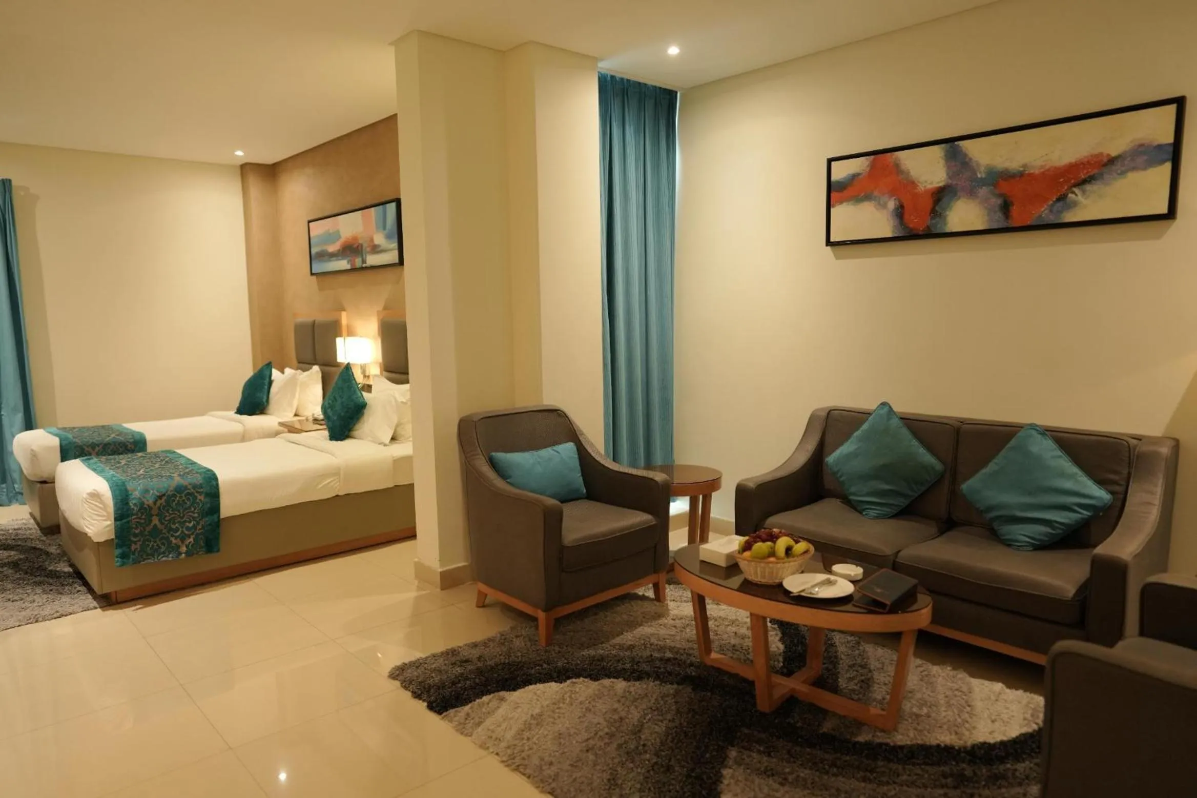 Seating area, Bed in Meshal Hotel