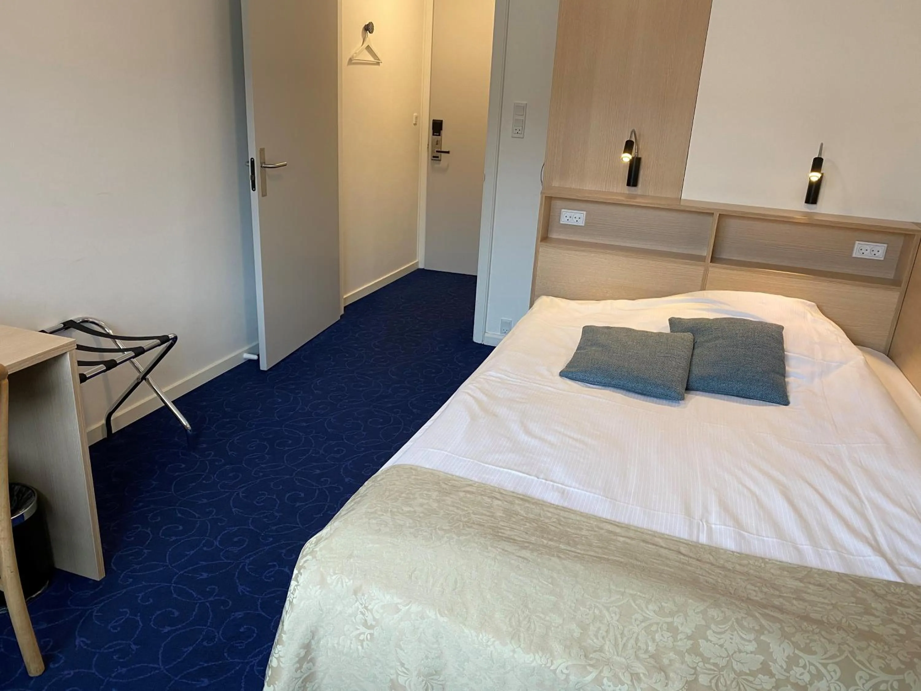 Bed in Herning City Hotel