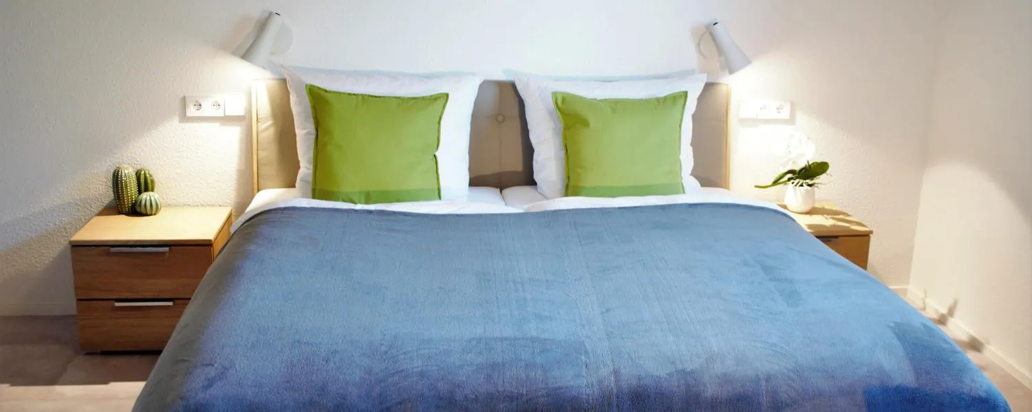 Bed in K3 Hotel Weissach Boardinghouse