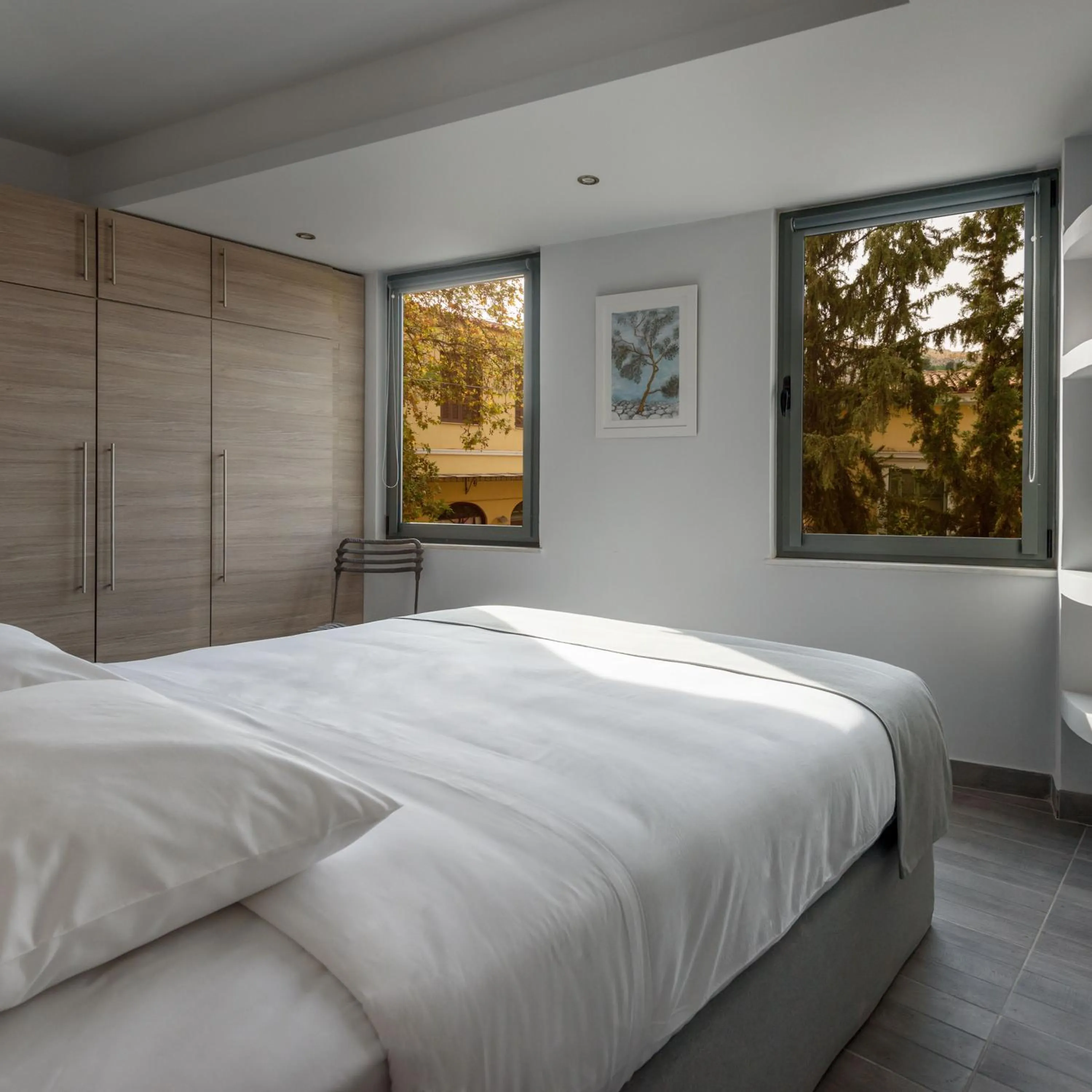 Bed in Fos Residential Apartments