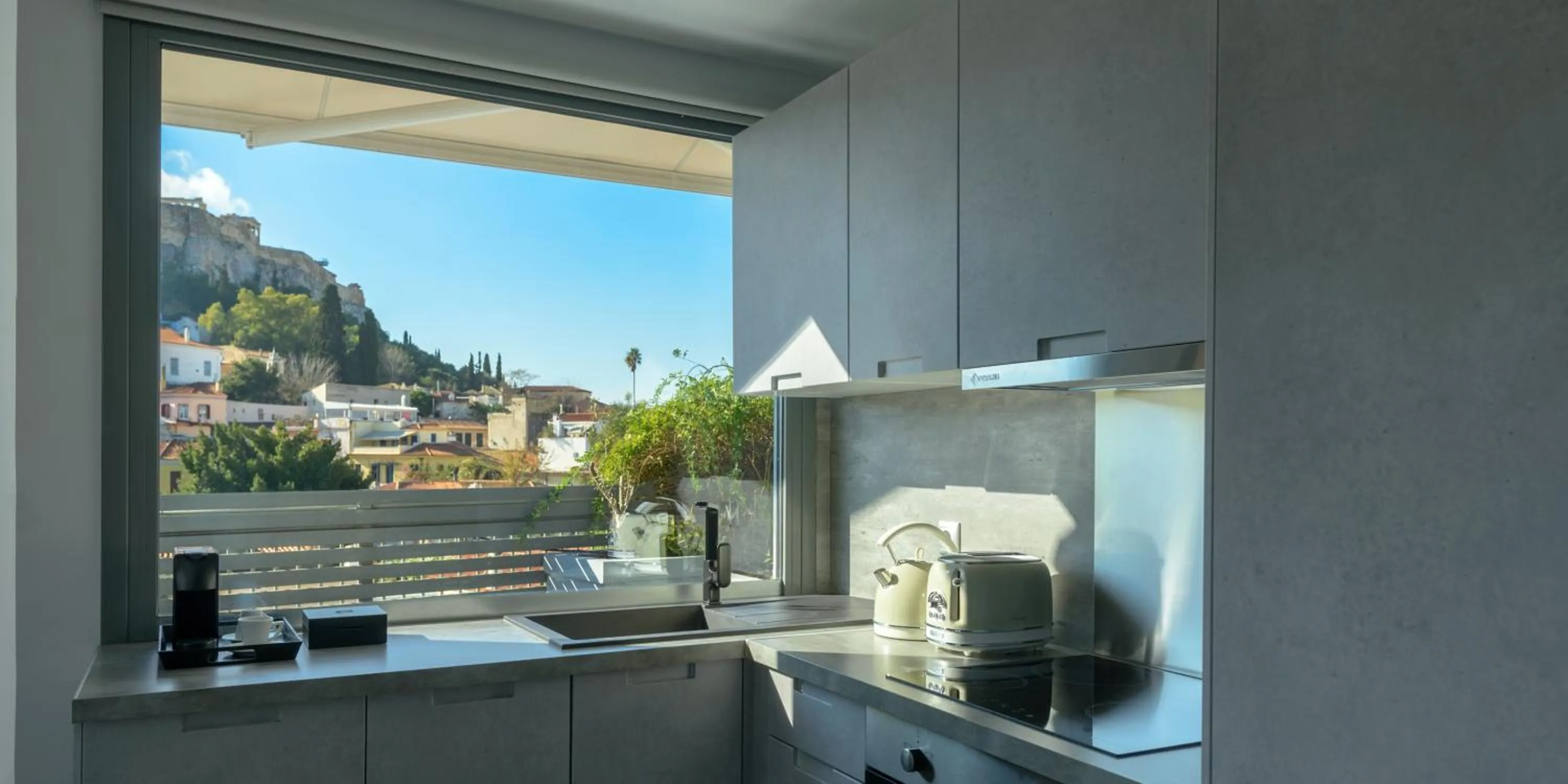 Kitchen or kitchenette in Fos Residential Apartments