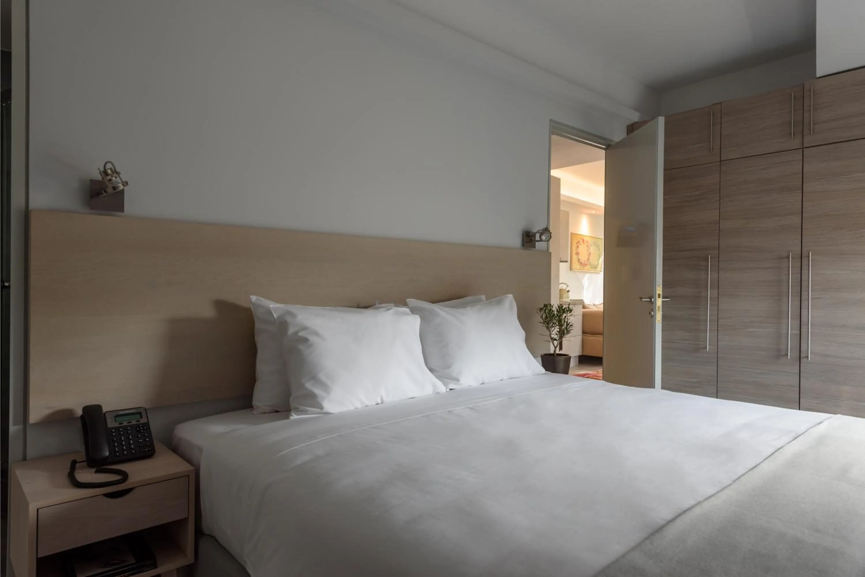 Bed in Fos Residential Apartments