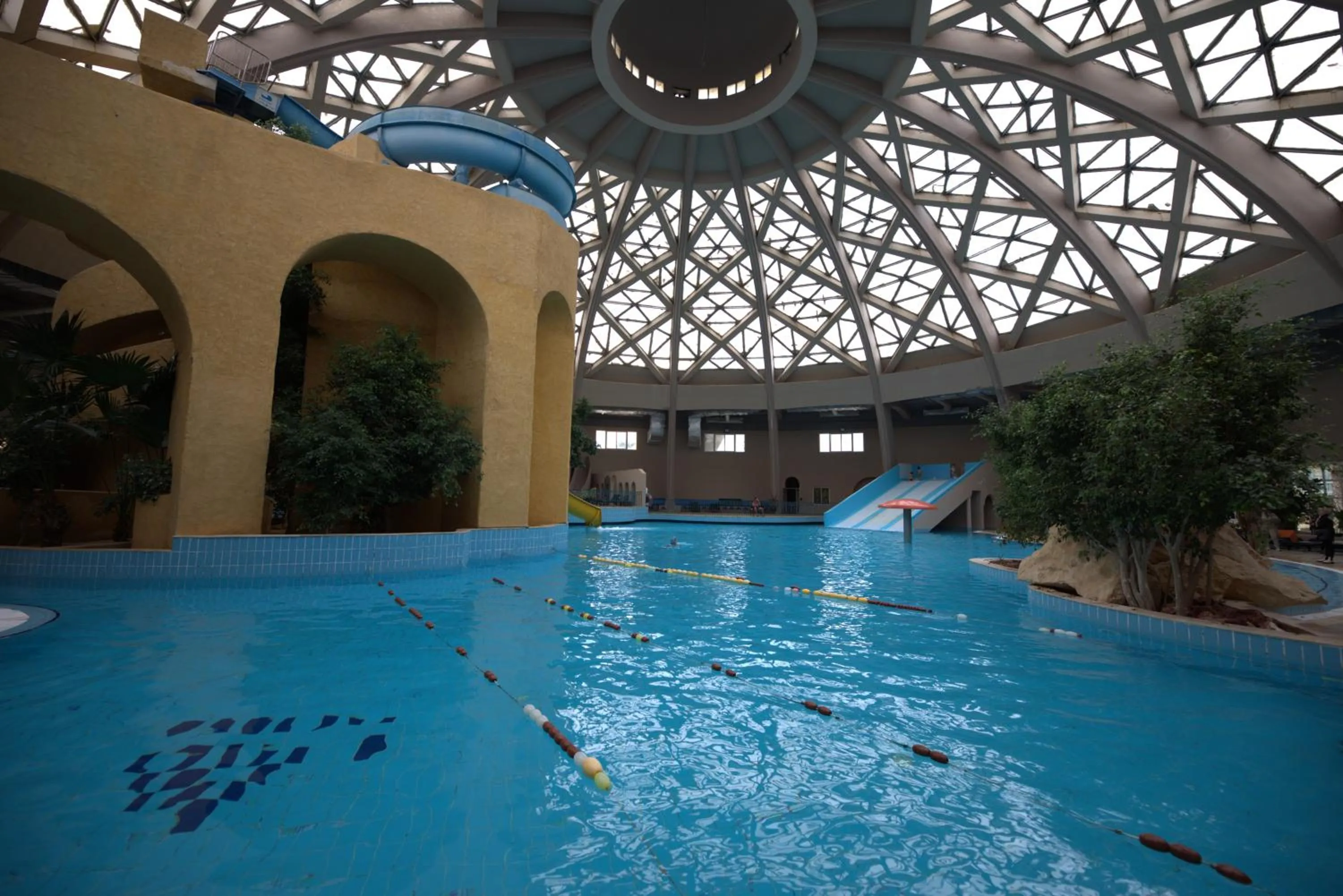 Swimming pool in Suites Hôtel Les Charmilles & Spa