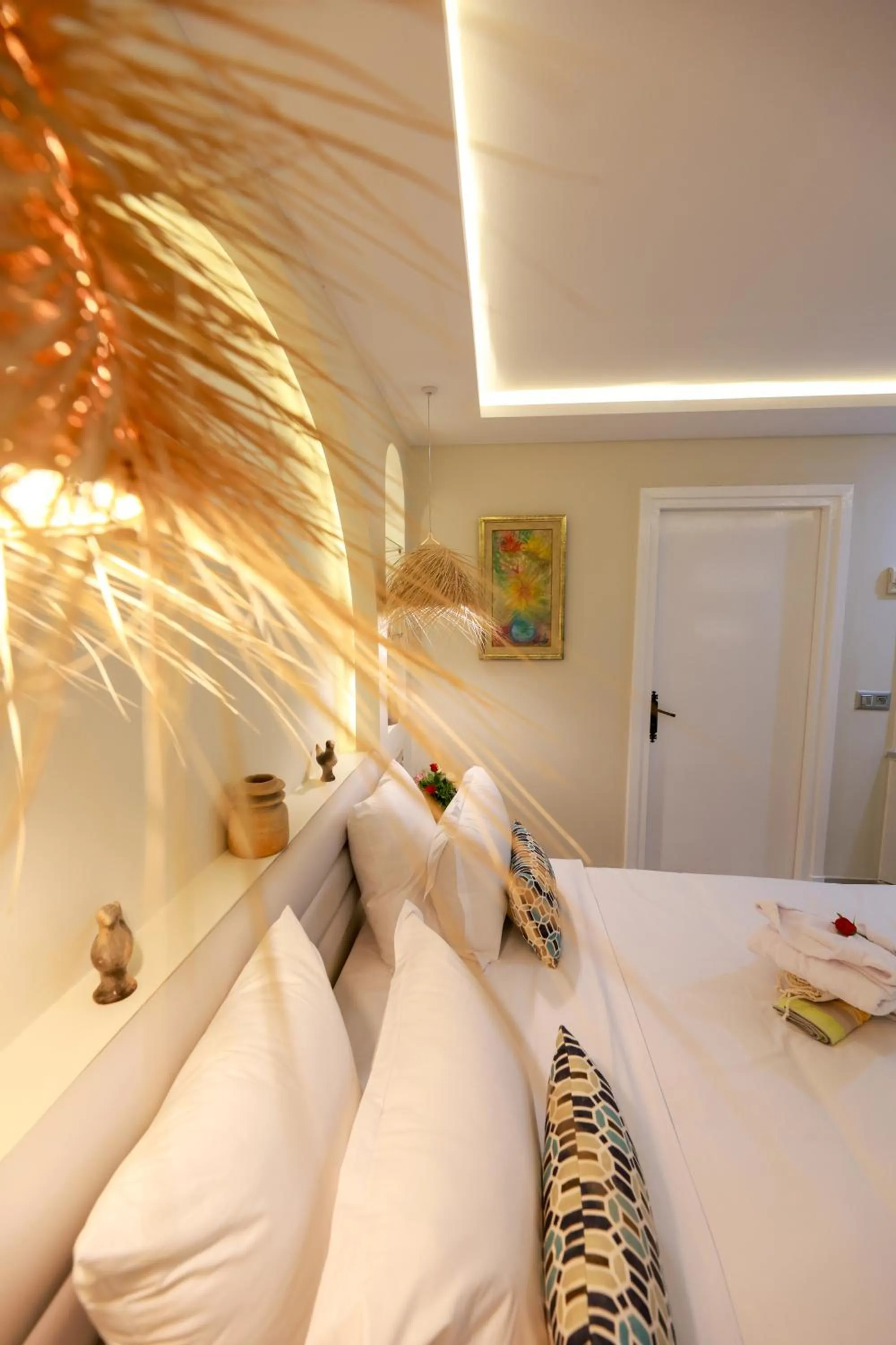 Bedroom in Suites Hôtel Les Charmilles & Spa