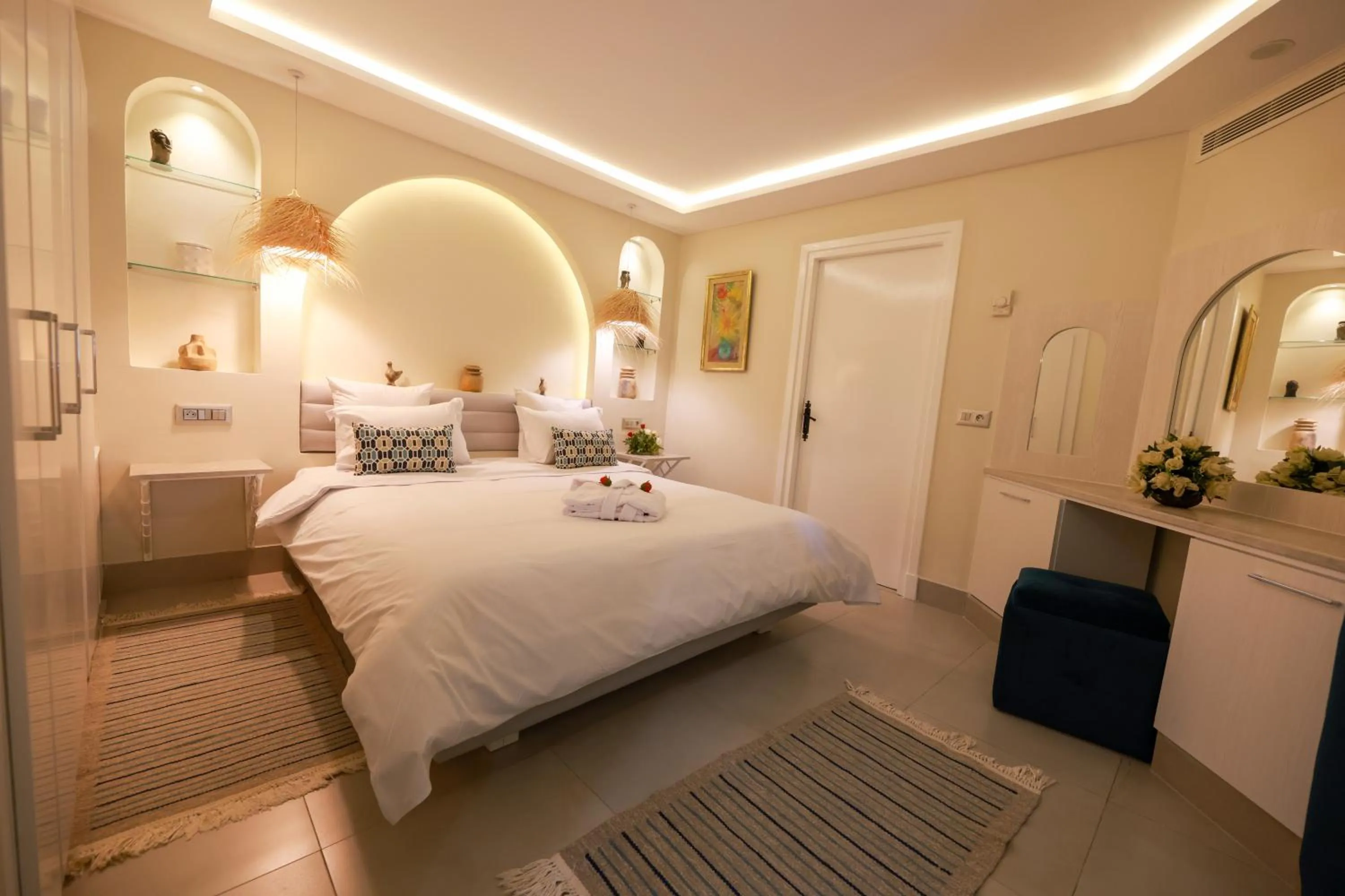 Bedroom in Suites Hôtel Les Charmilles & Spa