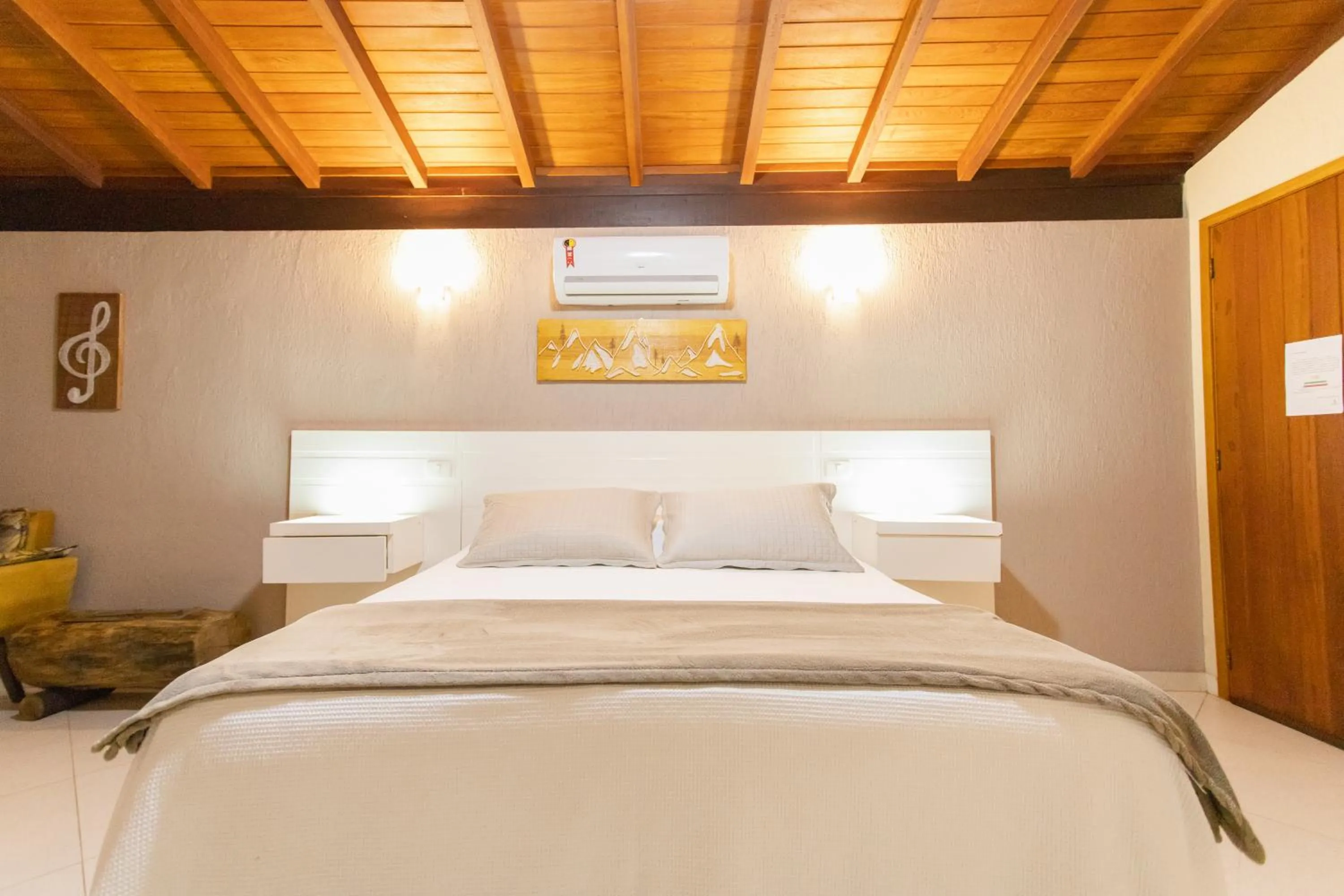 Bed in Pousada Cantagalo