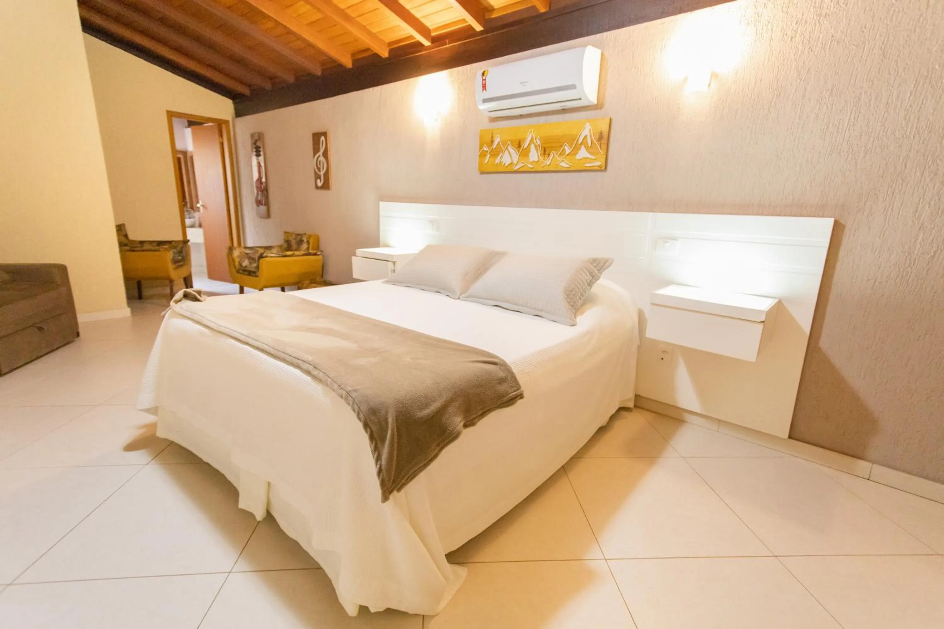 Bed in Pousada Cantagalo