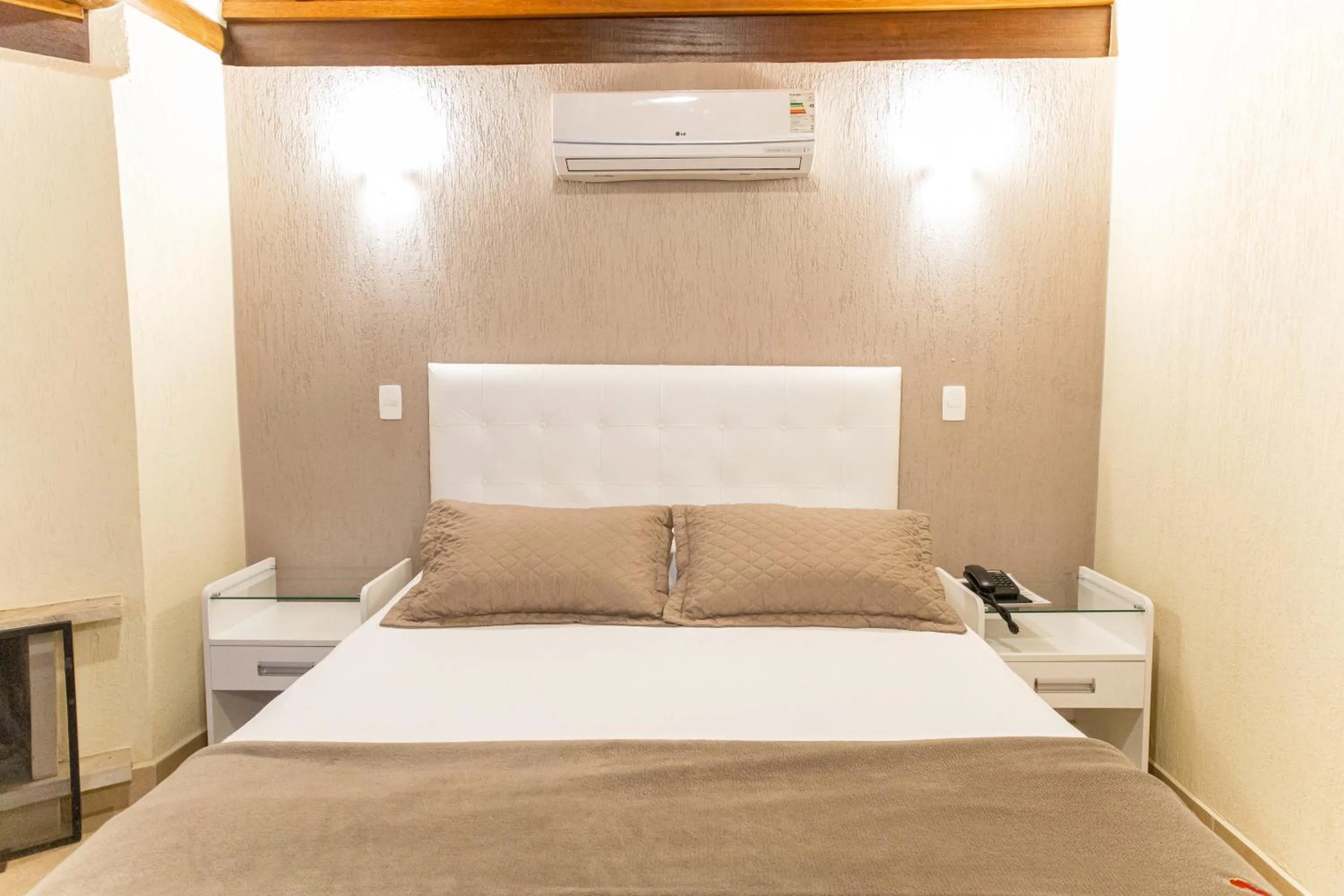 Bed in Pousada Cantagalo