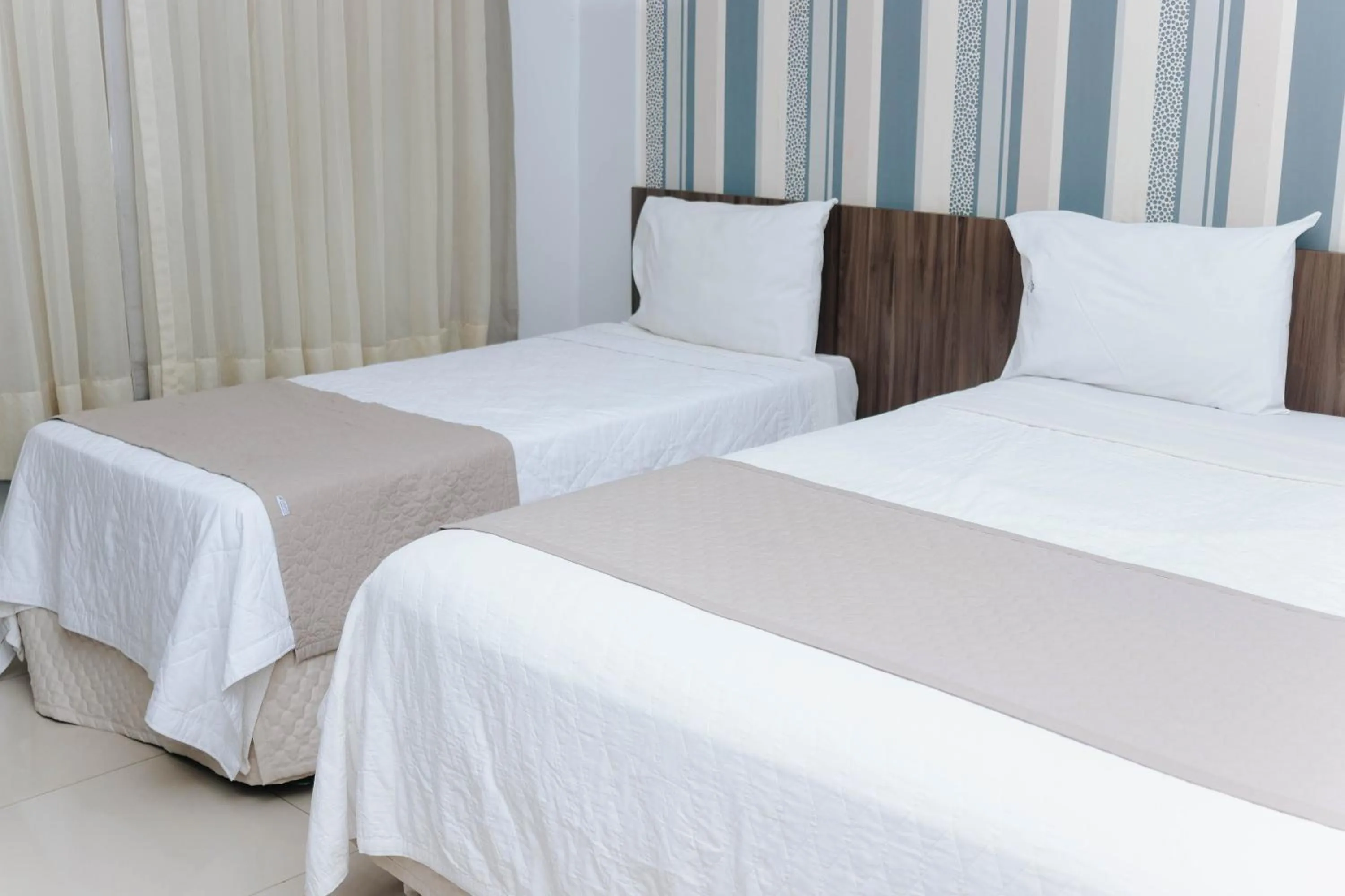 Bed in Premier Pallace Hotel