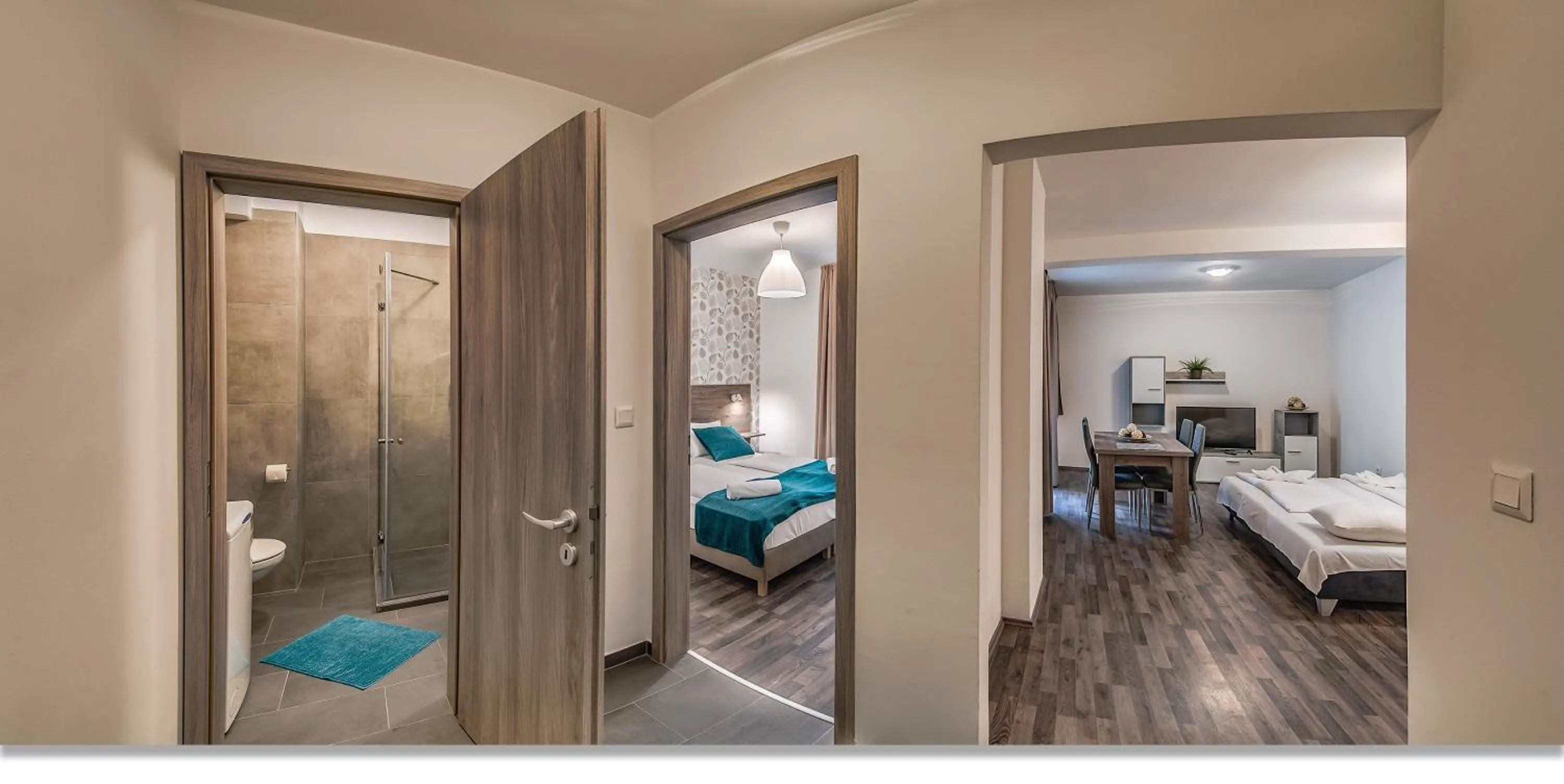 Living room, Bed in Nova City Apartments