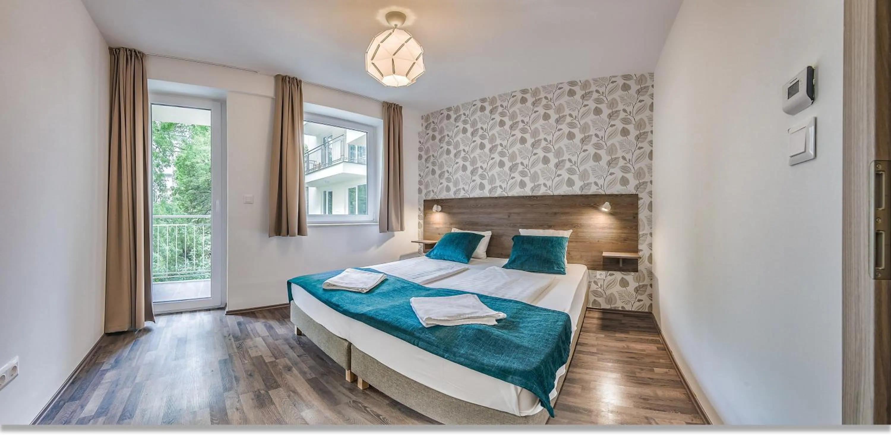 Bed in Nova City Apartments