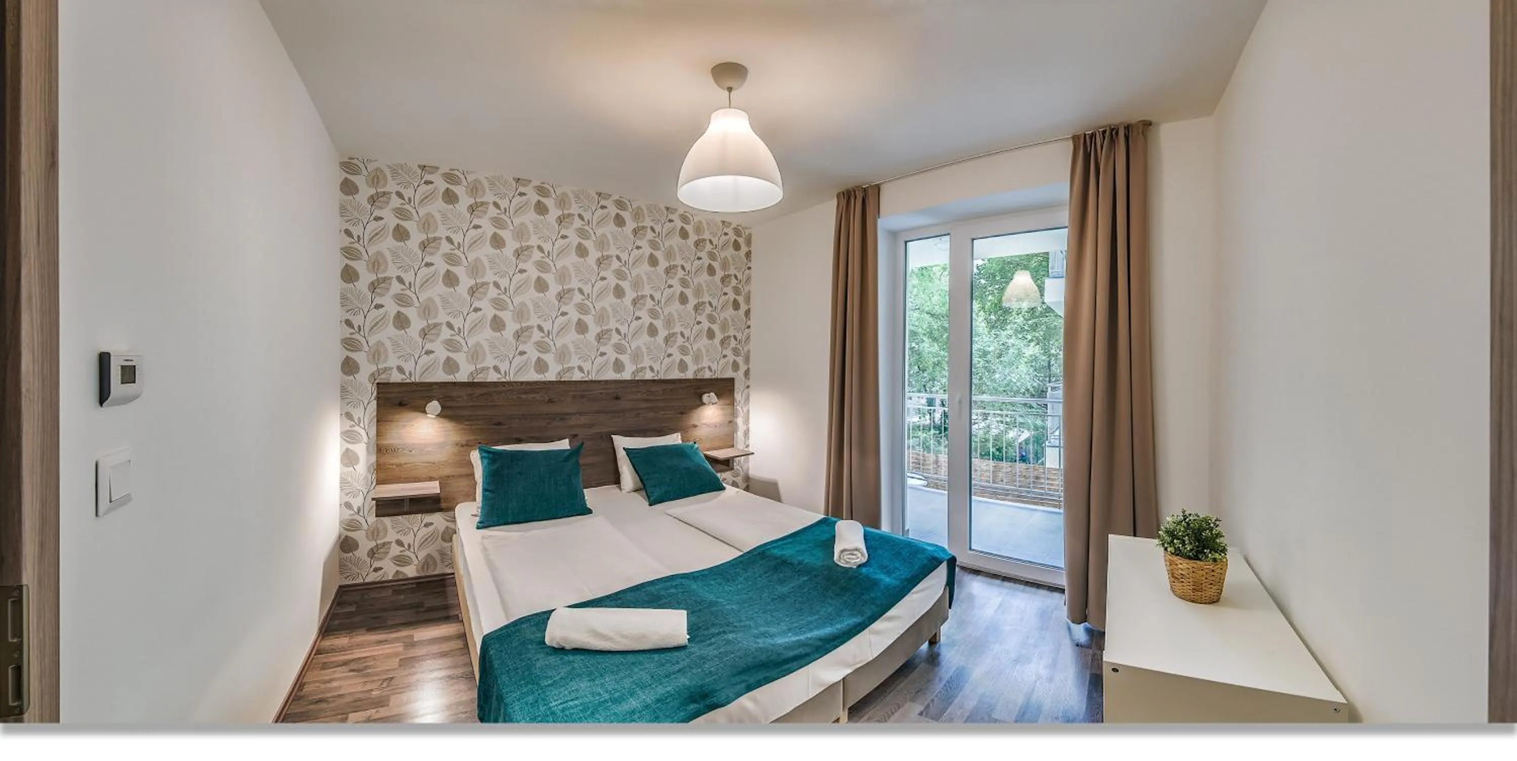 Bed in Nova City Apartments