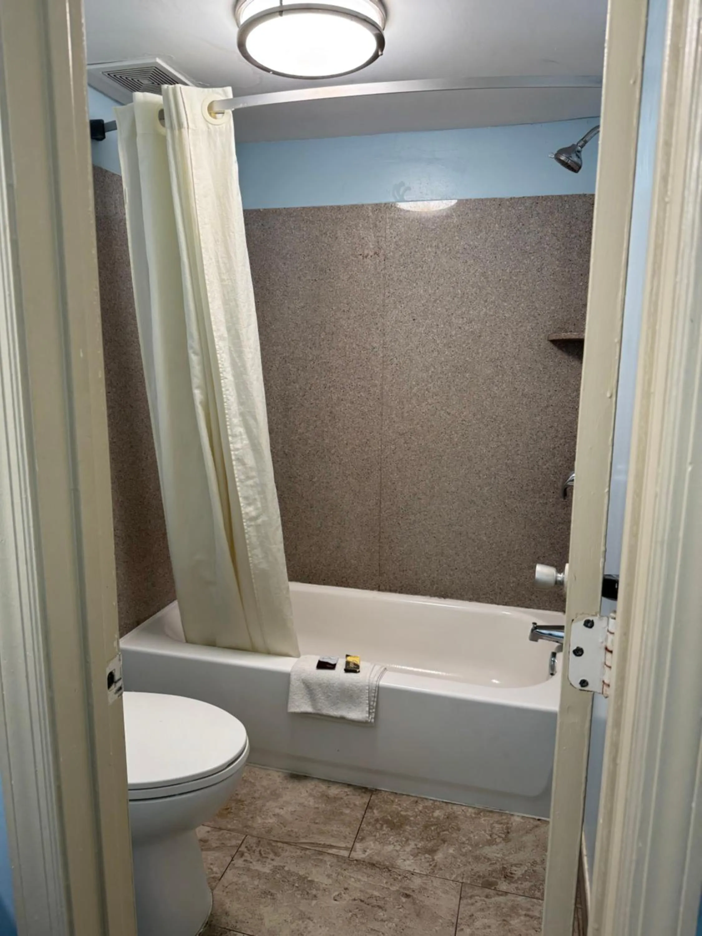 Toilet in Red Carpet Inn & Suites - Danville