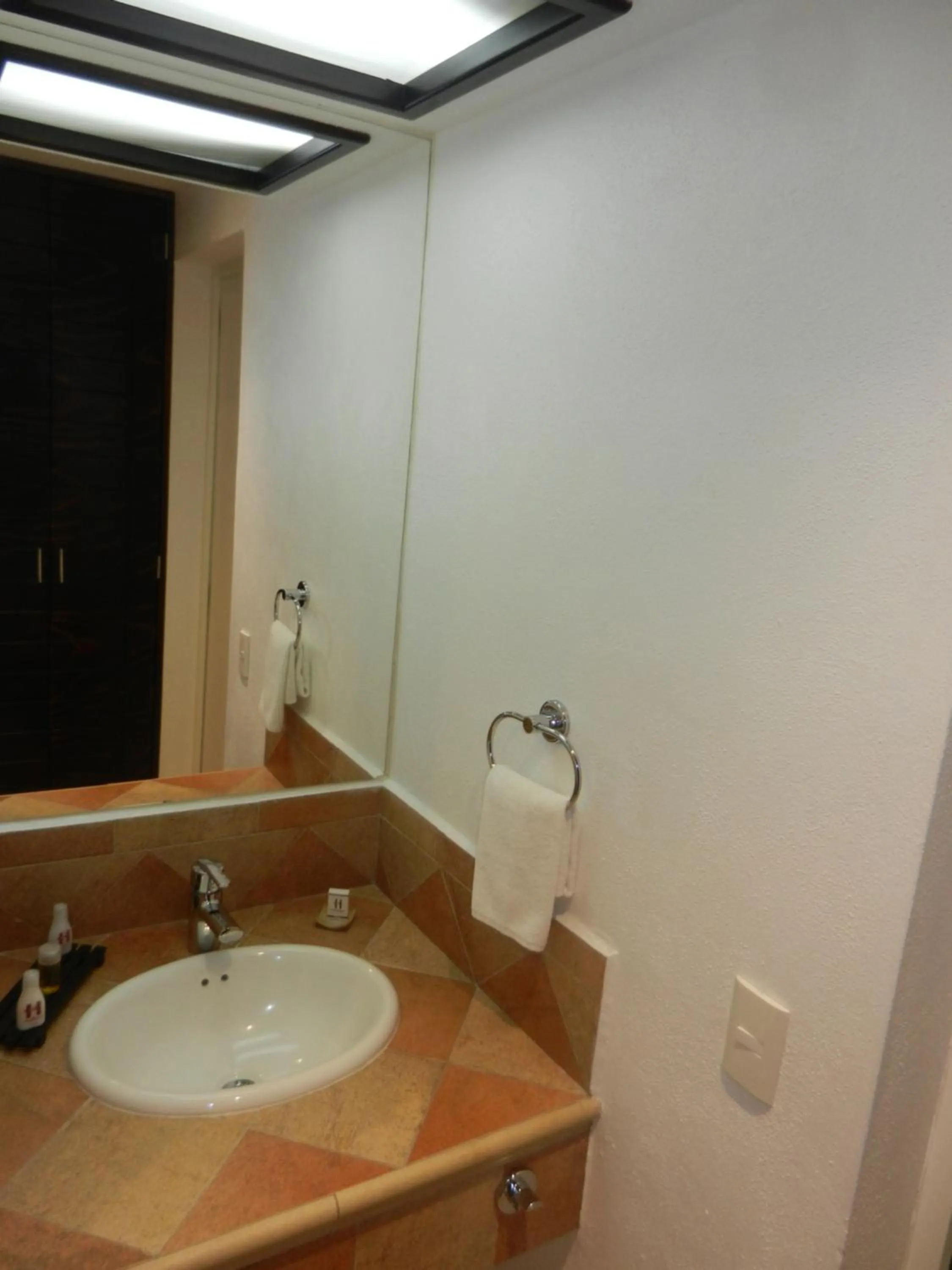 Bathroom in Hotel 9 Manantiales