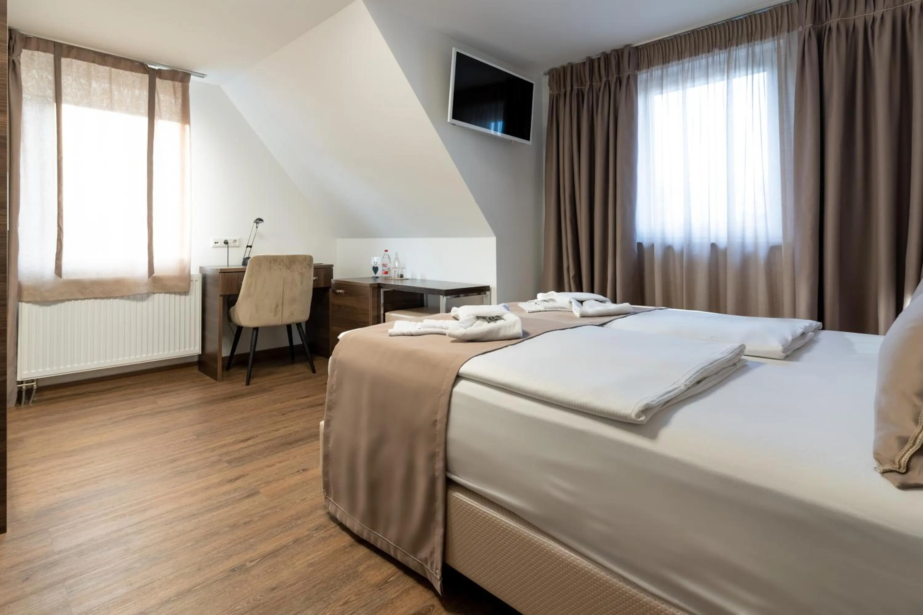 Bed in Hotel Myrsini