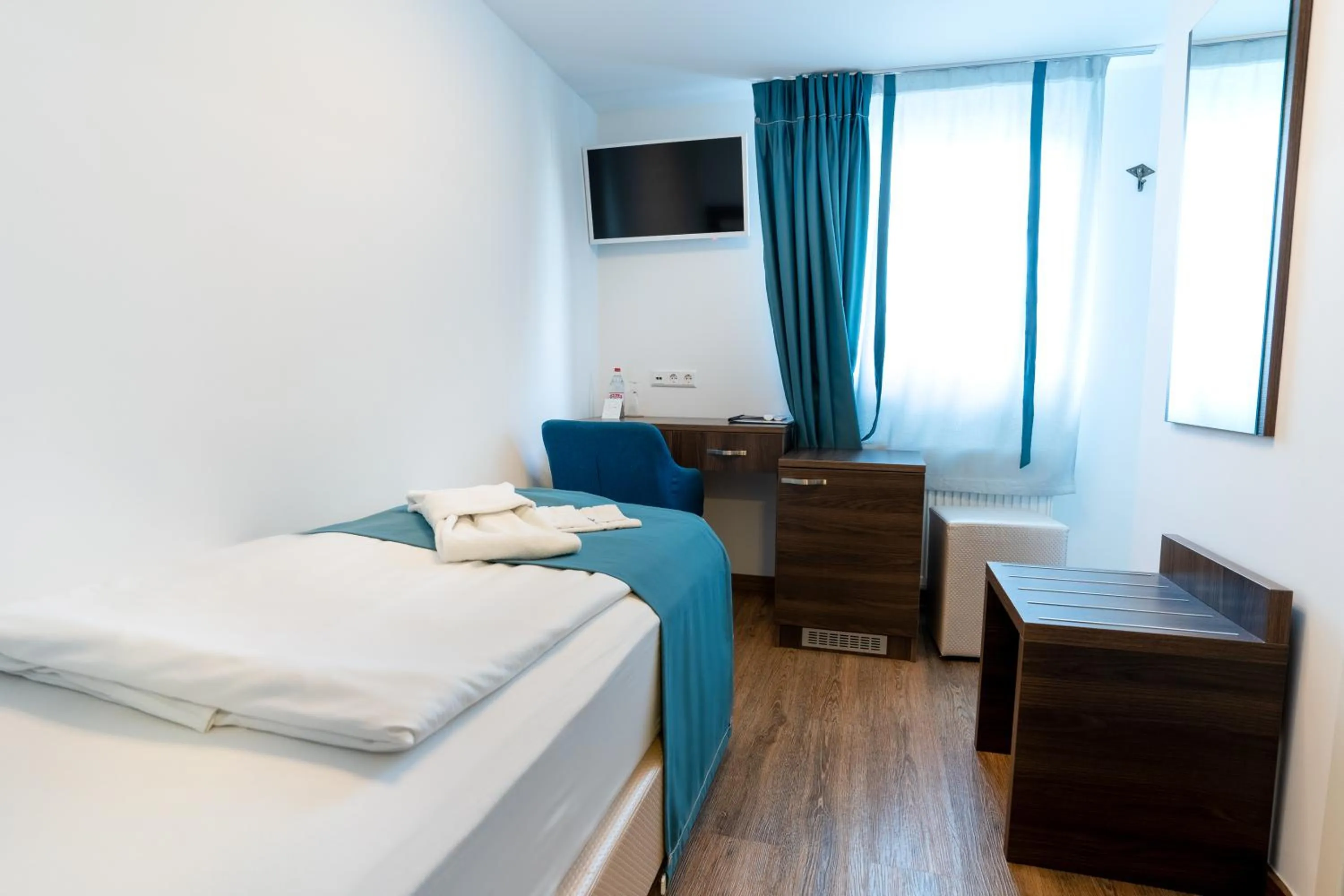 Bed in Hotel Myrsini