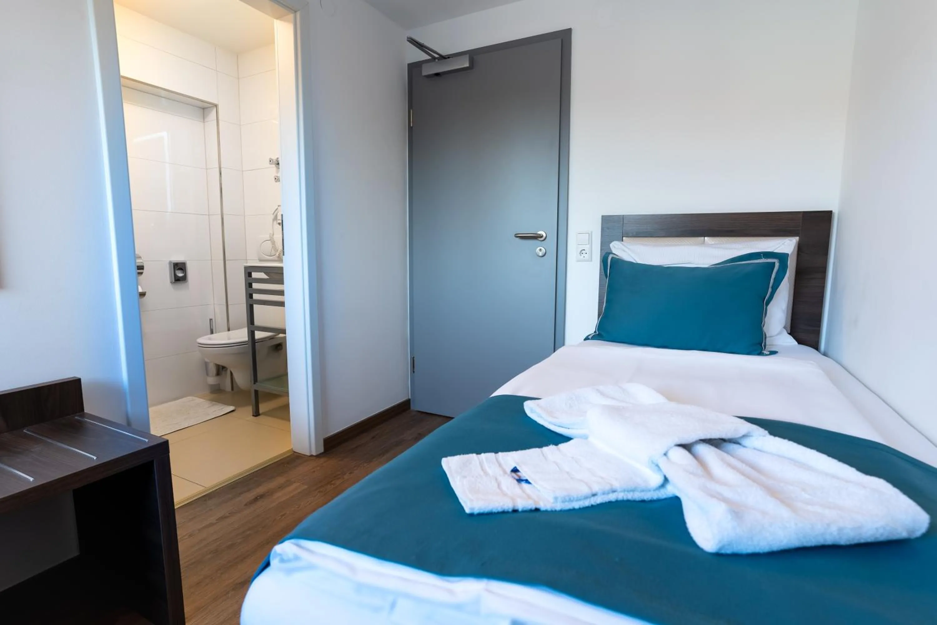 Bed in Hotel Myrsini