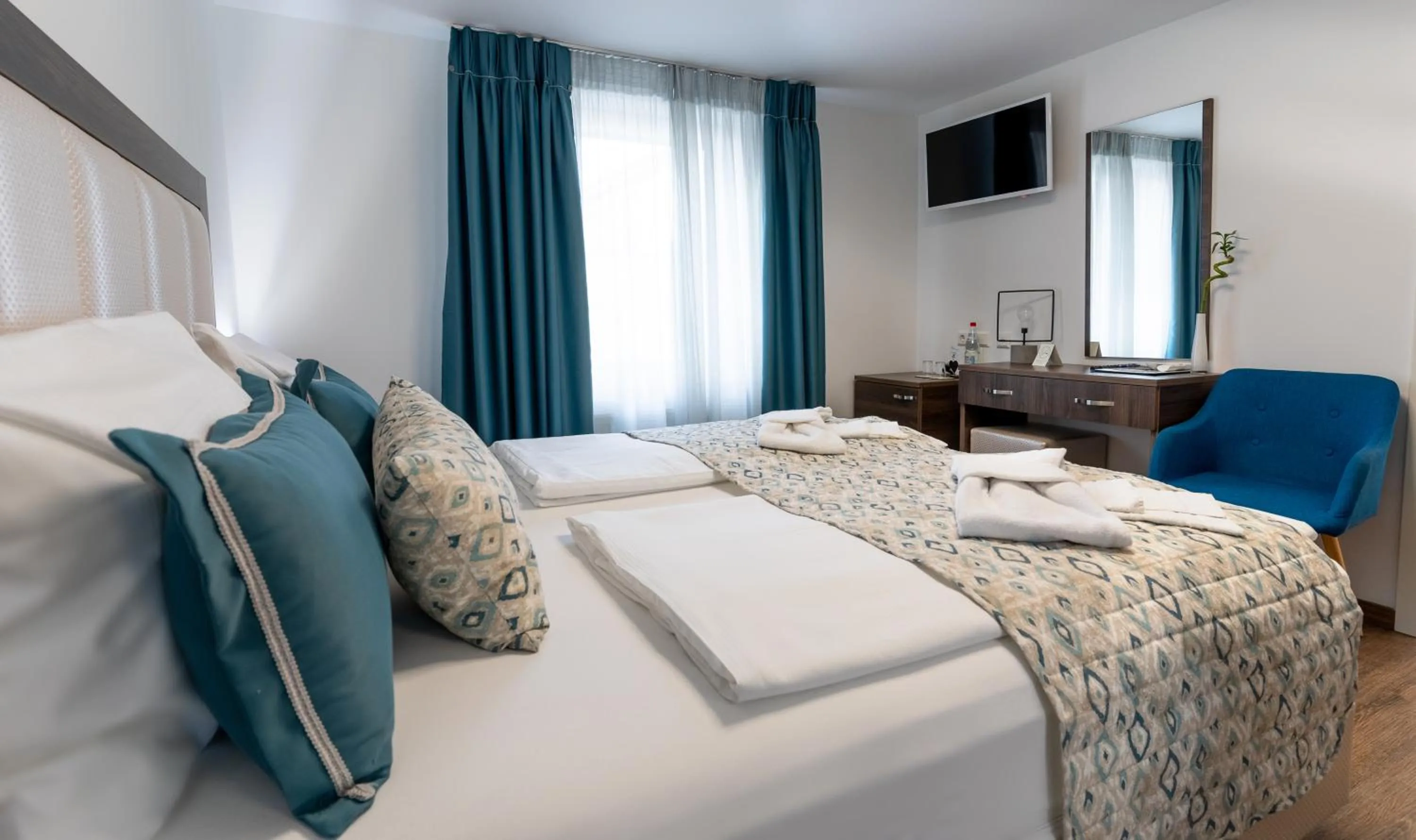 Bed in Hotel Myrsini