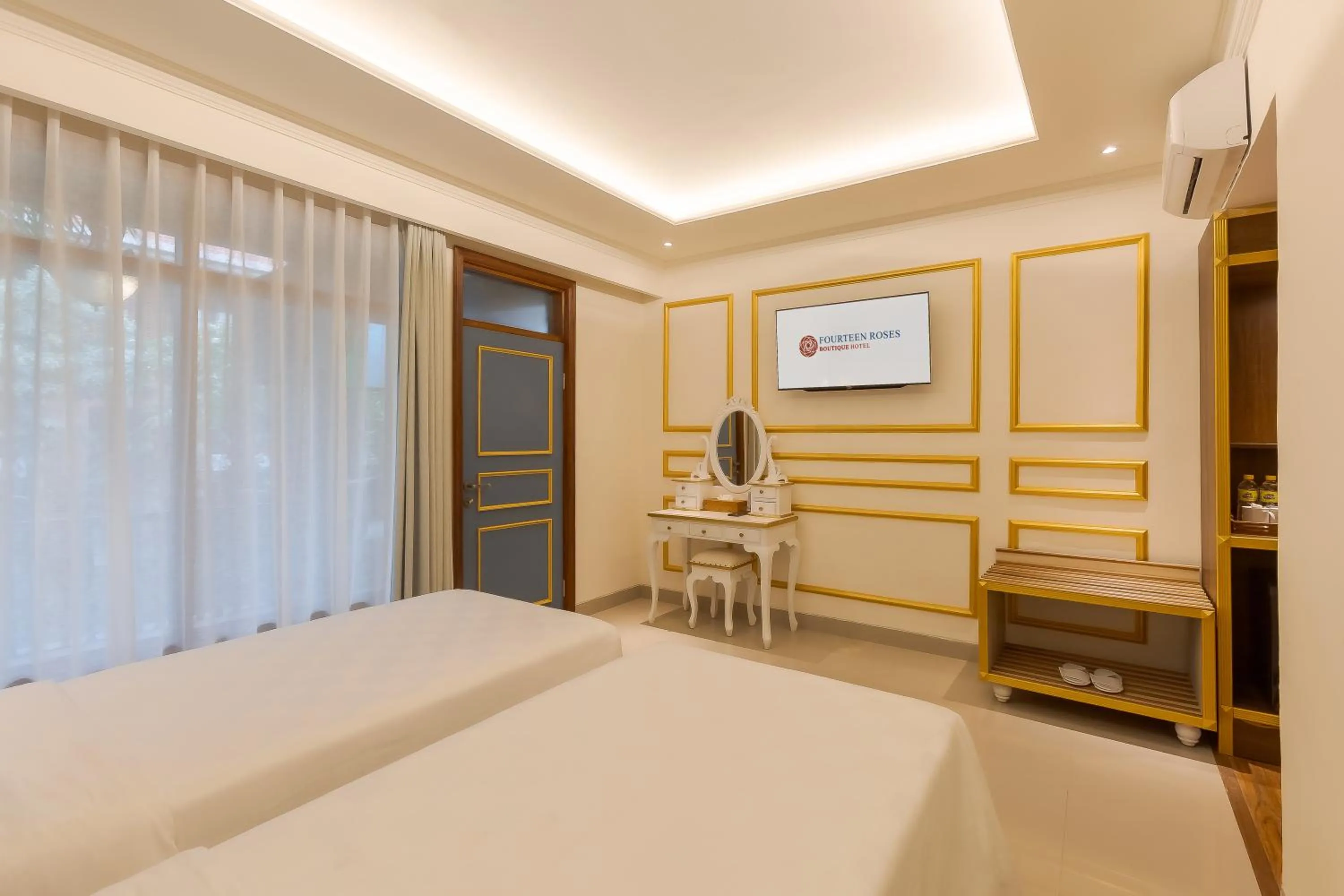 Bed in Fourteen Roses Boutique Hotel, Kuta