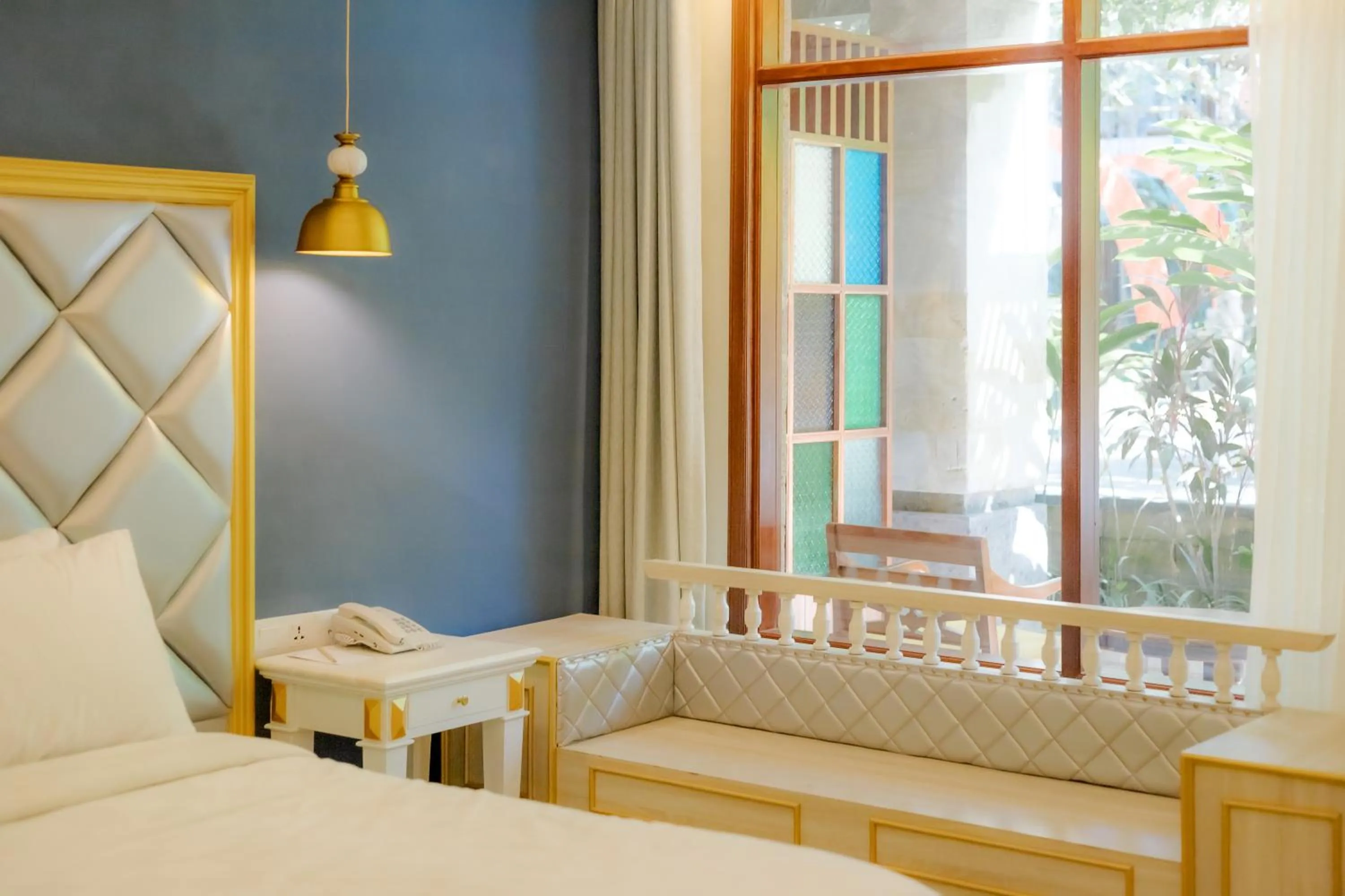 Bed in Fourteen Roses Boutique Hotel, Kuta