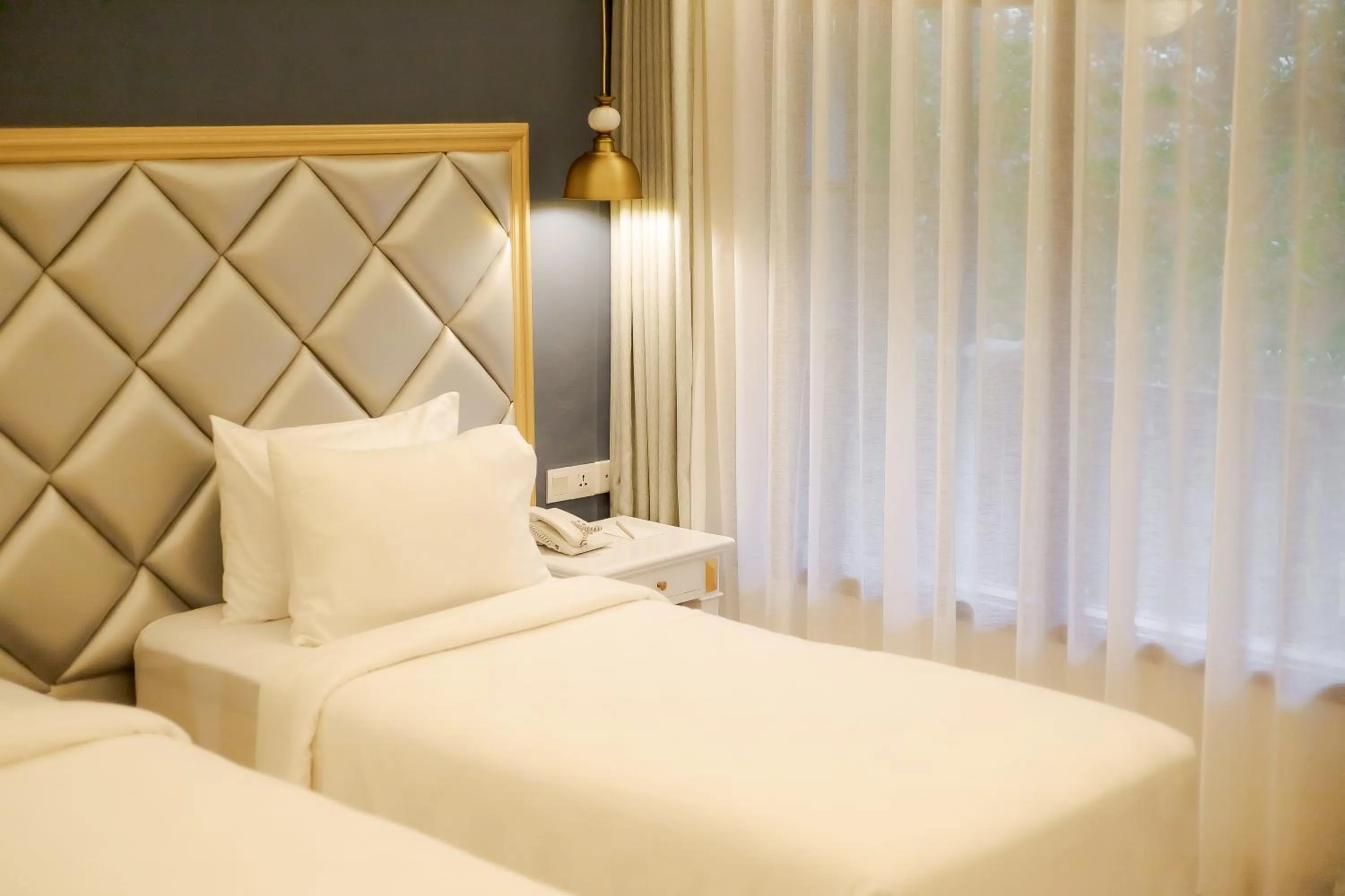 Bed in Fourteen Roses Boutique Hotel, Kuta