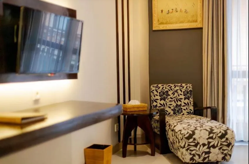 Bed in Fourteen Roses Boutique Hotel, Kuta