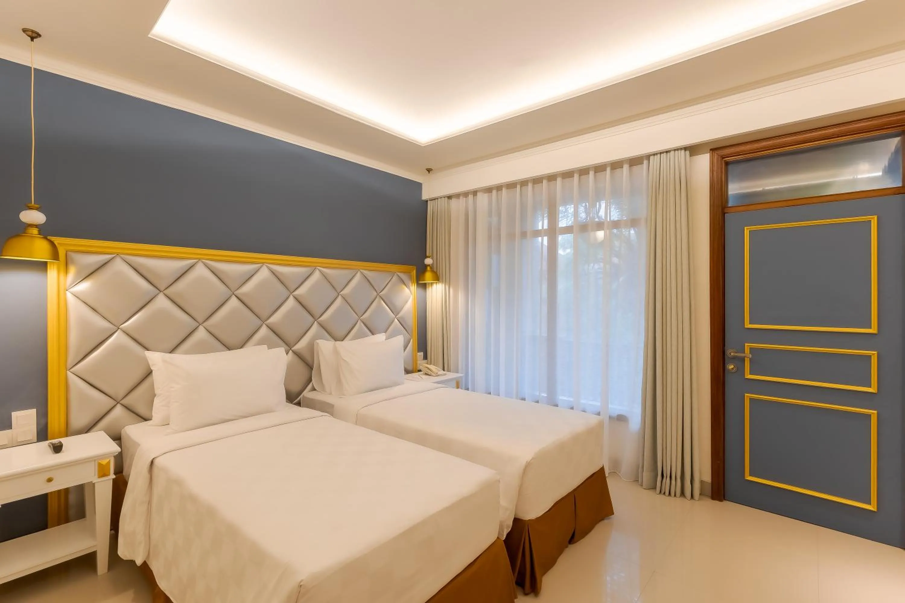 Bed in Fourteen Roses Boutique Hotel, Kuta